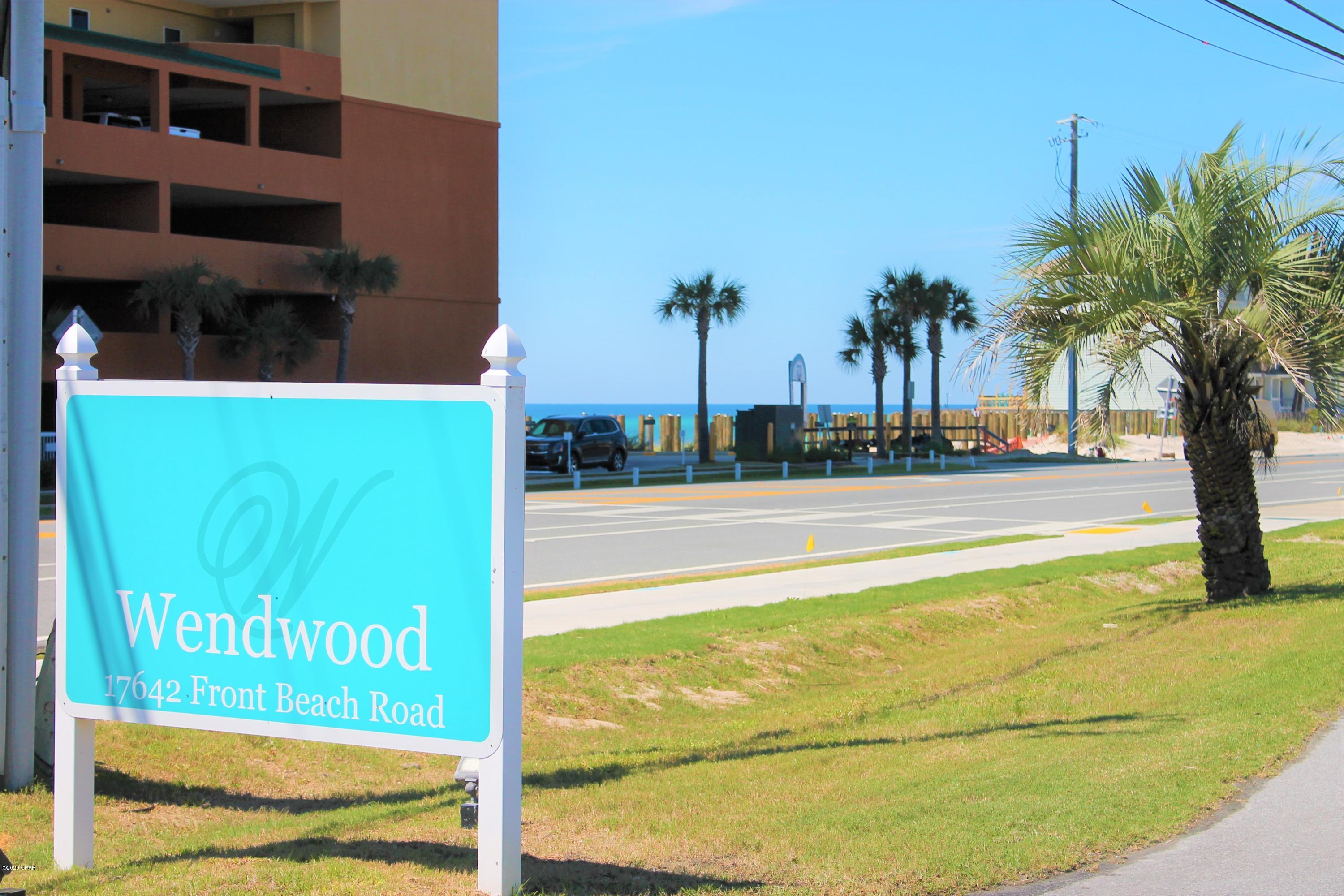 Well maintained & cared for Beach/Nautically themed unit. Large covered, front, patio. Public Beach Access is approximately within 0.1 miles (5 min. average walk). Tile flooring adorns the entire unit. Spacious Living Room. Dining Area. White & bright, Eat-in Kitchen w/Breakfast Bar Island & covered Patio. Front Guest Bedroom. Full Hallway Bathroom. Master Bedroom w/Walk-in Closet, en-suite Full Bathroom & private covered Patio. Easy access to FL. Hwy 79, Scenic Hwy 30A & Panama City Beach Pkwy. Dining, Entertainment, Shopping & Services are minutes away. Wendwood is convenient to the heart of the Tourism District of Pier Park. The complex's amenities include a pool shuffleboard & clubhouse.