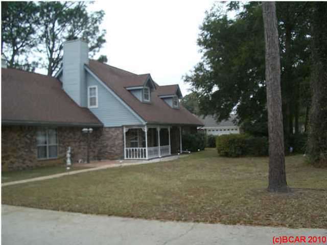 Very spacious traditional home is centrally located, close to entertainment, shopping, schools, dining and Tyndall AFB. The lower level of the home features all living areas, a bedroom and full bath. The second floor offers the 2 other bedrooms as well as another full bath. Lots of storage, closet, countertop and cabinet space. Kitchen is very large and features an island for extra space. Home has a den with a fireplace and has parquet flooring in the foyer and dining room.