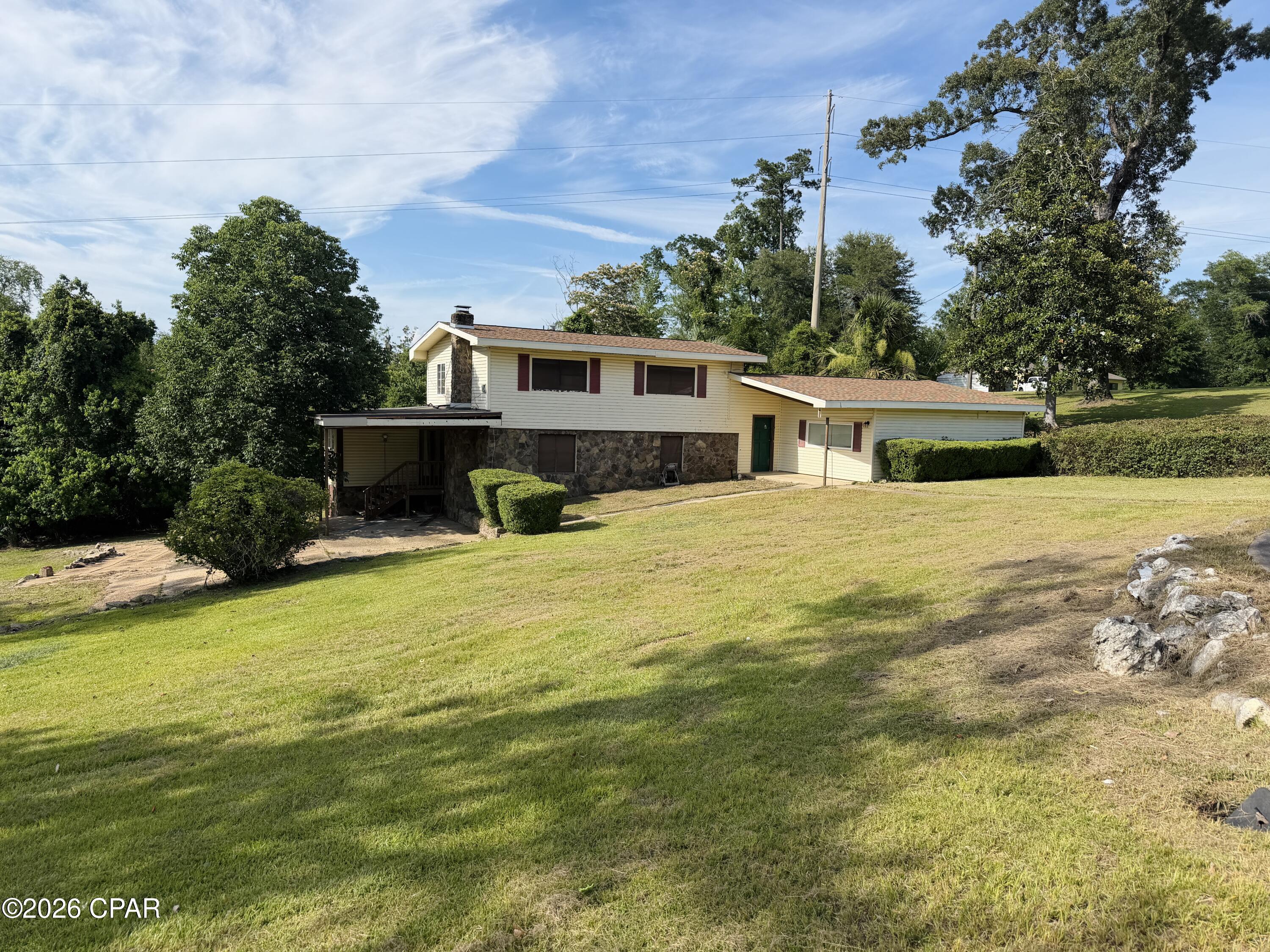 Investment opportunity with tremendous potential! This 4-bedroom, 1.5-bath, two-story home offers just under 2,000 square feet of living space and sits on a spacious lot of nearly one acre, a rare find in this location. Currently under construction, this property provides the perfect opportunity for an investor, builder, or buyer looking to complete a project and add value. The home features attractive exterior rock finishes that provide excellent curb appeal and a solid foundation for the vision ahead. With ample yard space, a desirable location, and significant upside potential, this property is ready for its next chapter. Bring your ideas and unlock the possibilities!