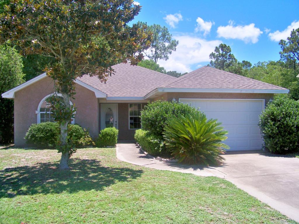 Whether you are a first time home buyer or simply looking to relocate to Lynn Haven, this home deserves your attention. Loads of curb appeal, split bedroom floor plan with open dining/kitchen area and vaulted ceilings in the living room. You will enjoy cooking in your galley kitchen with lots of counter and cabinet space and a separate pantry. There are three bedrooms (each with spacious closets) and two baths. Off the master bedroom is a covered and open patio overlooking your lush, fenced backyard with plenty of room for children, pets or simply solitude. Located in a quiet community close to great schools, shopping, dining, doctor offices and employment venues, you will wonder why you didn't make this move long before now. This is a Fannie Mae Homepath Home. All measurements, ages, room