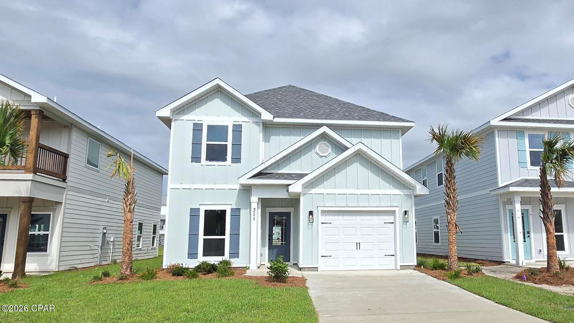 Welcome to 311 Robinson Bluff Road, a new home at Colonial East in Panama City Beach, FL. This home offers a perfect blend of elegance and relaxation, ideally suited for those in search of an exquisite second home or a serene vacation retreat.

With two stories, this home has four bedrooms, 3.5 well-appointed bathrooms, and the convenience of a single car garage. As you step through the inviting covered entry you enter a graceful foyer that flows seamlessly into an elegant dining area, setting the stage for memorable family gatherings. The heart of the Alabaster features an open-concept kitchen and family room, where a spacious center island, ample pantry, and abundant cabinetry invite culinary exploration and effortless entertaining. Interior design features of this home include EVP flooring throughout, elegant quartz countertops, tile backsplash in the kitchen and stainless-steel appliances.

Tranquility defines the main-level primary suite, complete with a luxe ensuite bath featuring a dual sink vanity, an oversized shower, and a spacious walk-in closet. Venture upstairs to discover a versatile living space that is ideal for media enjoyment or as an additional lounge space--flanked by three additional bedrooms. Each additional bedroom has been designed with spacious closets and two share a bath while the fourth bedroom has a private ensuite bathroom.

Added conveniences include a substantial main-level laundry room with provisions for full-size appliances and a discreetly located powder room near the foyer.