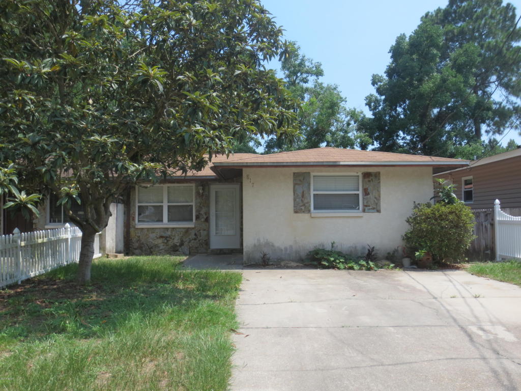 Location, location, location, 3 bedroom 2 bath duplex ready for you and your family. Kitchen has tile floors, granite countertops, smooth top stove, and refrigerator with ice maker all convey with the home. Large living room and dining room has the same tile floors while bedrooms have carpet. The guest bath has granite counter top on the single vanity tub and shower combo and tile floors. Florida room on the back of the home has a window unit for cooling but is not included in the square footage of the home. Windows were replaced with double pane e-low rating in 2009 and the outside HVAC system was replaced in 2008 while the inside unit and the roof was replaced in 2010-2011.  Back yard is privacy fenced large enough for a pool or kids swing set. Make an appointment to see this one today