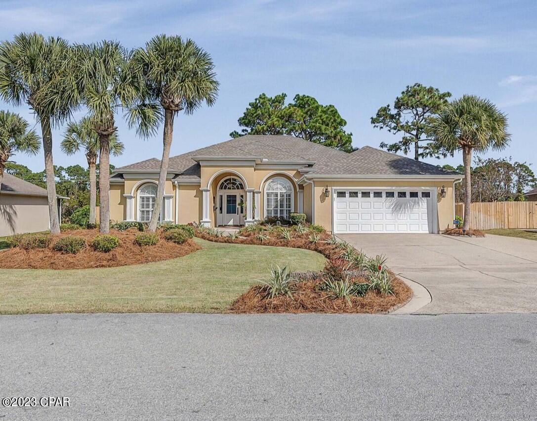 This Exquisite Custom Built 3 bedroom, 3.5 bathroom home has been meticulously maintained by its original owner and needs absolutely nothing! Excellent layout and floor plan with each bedroom having its own bathroom! This home features a formal dining room, large living room, oversized kitchen, and split bedroom design. You will find engineered hardwood floors, plantation shutters, high ceilings and expansive crown moulding throughout. The backyard screened lanai with pool includes a covered seating area accessible from the living room, kitchen, master bedroom and powder room. The privacy fenced back yard is perfect for families and pets. This home is located in an excellent location and the garage even has a side entry golf cart door for easy access to the newly anticipated Duplin Winery.