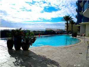 9th Floor! Features Comfortable Master Suite, 2 Full Baths, Bunk Room, 9ft Ceilings, Granite Countertops, Kitchen with Breakfast Bar, Dining Area, Living Room, Large Balcony with Electric Grill & Magnificent Views of the gulf and pool area. Condo just painted and new refrigerator. No furnishings. These units can Easily Accommodate 6 People. We have unit 305 listed for sale and YTD from 1/1/14 to 9/30/14 Gross Rental Income is $28,001.37!!! World-Class Amenities Include: State-of-the-Art Fitness Center, Wine Bar, 2,000 sq. ft. Heated Tropical Pool and Whirlpool Spa, Poolside Umbrella and Beach Chair Service, Community Activity Room, Secure Parking, and So Much More! All This Located Only Minutes Away from Pier Park Mall and the New International Airport!