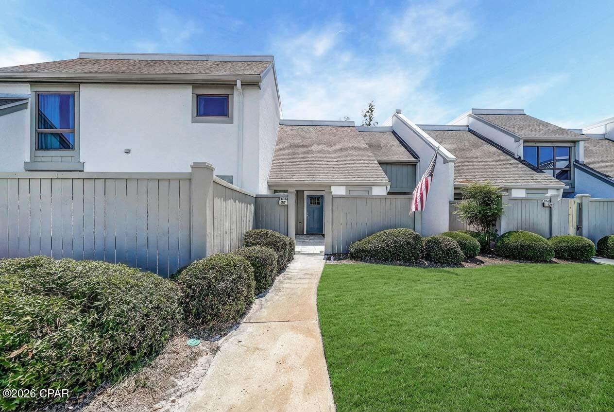 Here is an opportunity to own a recently renovated 2 bedroom - 2 and 1/2 bath golf villas, located in Bay Point Golf Villas 1.  You own both the upstairs and downstairs so you don't have to worry about neighbors stomping around above you in the middle of the night.  The unit has all new two panel doors and frames, brand new stainless steel refrigerator, brand new stackable washer and dryer, upgraded half bath downstairs, new base trim throughout entire unit, slat door for the HVAC closet, new barn doors in the master bedroom and bath, new paint throughout, new storage unit door and frame. The concrete walkway and gravel on the front patio was removed and replaced with pavers, also added a board-approved 20 foot paver patio extension out back so you can enjoy the back area.  

The kitchen counter is blue pearl granite paired with a white glass backsplash and high end white cabinetry, brand new Samsung French door refrigerator with ice maker. The laundry room had the drop ceiling removed and replaced with a tongue and grove ceiling, along with new trim, clothes- folding counter with granite top and brand new LG full size stacked washer and dryer.  The staircase was completely replaced a couple of years ago with real wood and stained dark mahogany. The main floor has Florida style wood grain ceramic tile flooring throughout.  Peaden Air Conditioning installed the new AC unit and handler in July 2022 and water heater was installed in 2023.  The front windows and the dining room windows are scheduled to be replaced by the HOA.  New landscaping has been installed along with a new irrigation system for Golf Villa 1.  Bay Point is a gated community with 24 hour roving security, tennis courts, restaurants, a deep water marina and it is only minutes to the Gulf.  Bay Point has a golf course that is the only Nicklaus designed golf course in NW Florida.

Some of the images in this listing have been Virtually Staged, the unit is not furnished, but appliances are included.  The owner of the property is a licensed Realtor.
