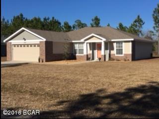 EASY DRIVE TO TYNDALL AFB from this quiet neighborhood in a country setting! Just down the highway to the grocery store and mall, this 4 bedroom/2bath home has a huge great room, separate formal dining room and a breakfast nook off the kitchen. MBR has 2 walk-in closets. MBA has raised vanity and skylight for lots of natural light. The 4th bedroom has 2 closets and there is a lge linen closet in the hall, plus a big coat closet off the great room. French door, with blinds between the glass, accesses the covered 12'x18' back porch which is the perfect place for cookouts and entertaining!