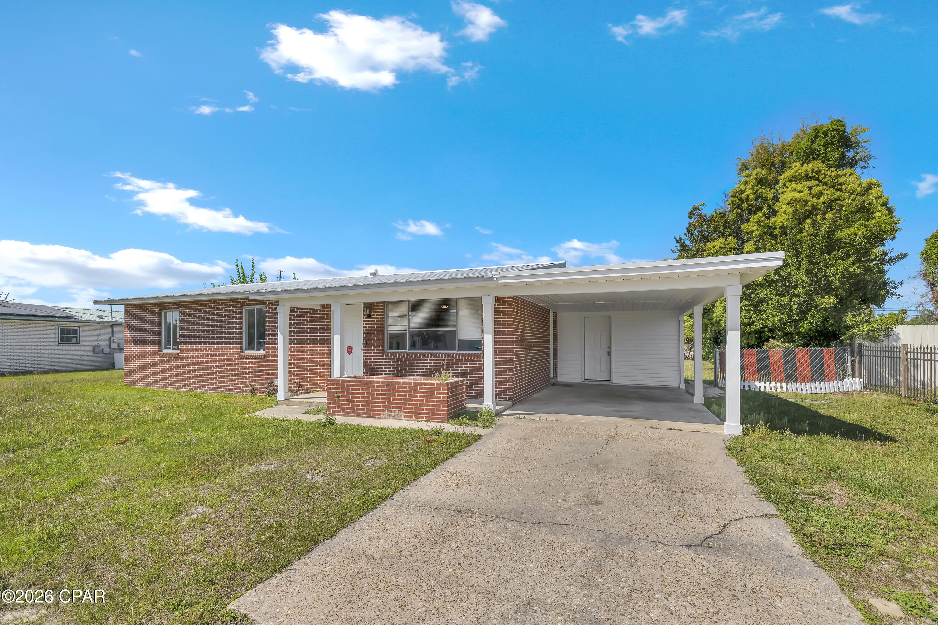 RECENTLY RENOVATED | UPDATED KITCHEN | OVER 1/4 ACRE WITH NO HOA

5009 Kendrick Street is located in Callaway, Florida within the greater Panama City, Florida area, offering convenient access to nearby shopping, dining, and daily essentials.
Brick home featuring recent renovations and a clean, functional layout. The kitchen has been fully updated with brand new shaker-style soft closing cabinets, stainless steel appliances, and granite countertops. Additional interior updates include LVP flooring throughout and interior paint.

The layout includes 3 bedrooms and 2 bathrooms, along with a separate laundry room with washer and dryer included. An enclosed Florida room adds flexible space that can function as a bonus room, office, or additional living area depending on use.

Exterior features include a metal roof, covered carport, and a fenced backyard situated on just over a quarter-acre lot. No HOA restrictions.

All information is deemed reliable but not guaranteed; buyer to verify if important.