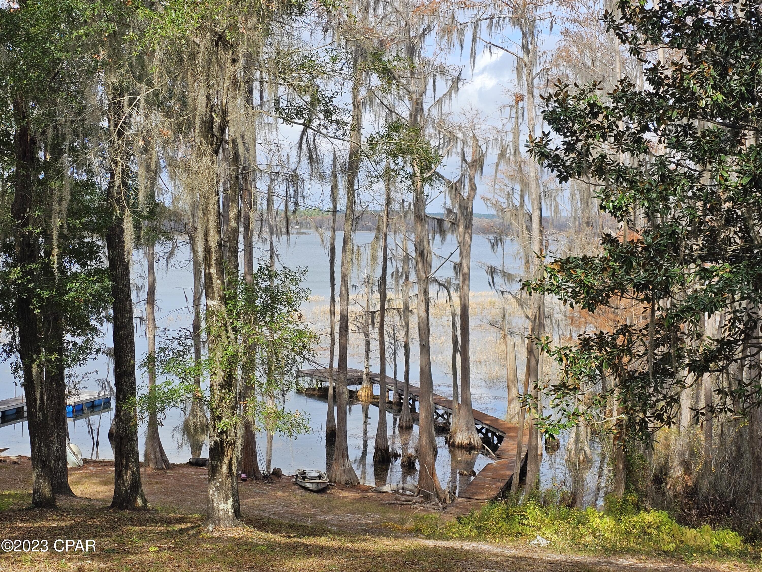 1+ ACRE, MOSTLY CLEARED, ON LUCAS LAKE!! Beautiful property on the VERY popular ~480 sq. acres Lucas Lake. Build a home or just create an awesome space to spend your weekends  with family and friends - motor boating, fishing, swimming, kayaking, picnicking, you name it! The dock is decent but needs a little refurbishing. Call your favorite Realtor Right Now! and go see this property. NOTE: Appraiser site says this is 3136 Lucas Lake, but that is a mistake. It does not have an address yes, but when it does, it likely will be 3134 Lucas Lake. PS Seller is a licensed contractor and stands by ready to help you with your home building plans.