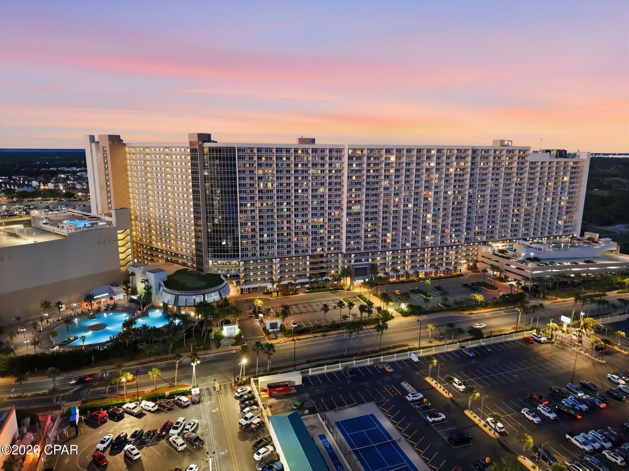 This 1 bedroom unit in Laketown Wharf has had a 'Consistent and Steady' STR history that has proven to bring back its guests every year. In 2025 this unit made up to $53,000 in STR income and consistently proves the same in 2026. (2025- GRI $53,100). It has built a reputation based on integrity, valued hosting, and quality history.  This unit is not new to the STR market so any investor that looks to purchase unit 305 will have a portfolio based on years of rentals.  The STR income has been steady and each year has gained a very high end profit.  Unit 305 is turn-key, is fully stocked, and comes fully furnished.  Overlooking the lake and the pool, the sunsets bring out the best in the view.  Located on the third floor, wait times for elevators are short, stairs are easily accessible as they are near the unit, and it is an end unit so traffic is quiet in this location of the premises.  NO long wait times which is an added bonus in the complex.  Located in the East building, the condo is close to all the amenities, restaurants, and entertainment.  This unit comes with two assigned parking spots in the East garage.  This condo was partially remodeled after the current owner purchased it. New furnishings throughout.  Please see video tour in the video section of the listing for the full effect.  Laketown Wharf offers its own private beach access for its guests.   On site, all amenities include 5 unique pools, a fitness center, a mini golf course, restaurants and shops, and 52,000 square feet of a lakefront boardwalk with gated 24-hour roving security. Unit 305 is priced to sell!
