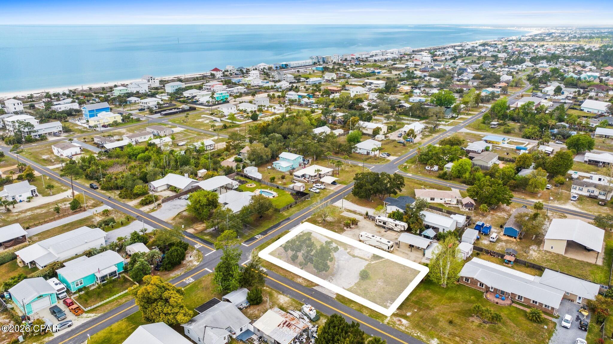 Seize this rare opportunity to own a 0.26-acre buildable lot just two blocks from the pristine shores of the Gulf of Mexico in the heart of Port St. Joe, Florida. Situated along the legendary Forgotten Coast, this quarter-acre parcel is perfectly positioned for a custom beach house, vacation rental, mobile home, or tiny home -- and best of all, no flood insurance is required, making your build and ownership costs more attractive from day one.
Enjoy everything this iconic coastal community has to offer right outside your door -- pet-friendly beaches, world-class shelling, fresh Gulf seafood, and stunning sunsets that never get old. Boat ramps are within 6 miles, a grocery market just 4 miles away, restaurants and shopping within walking distance, and the charming downtown Port St. Joe scene only 8 miles out.
Undeveloped coastal lots at this proximity to the water are becoming increasingly scarce in Gulf County. Whether you're building for personal use, investment income, or resale, this is the kind of ground-floor opportunity that doesn't stay available for long. Utilities will need to be connected to the lot -- buyer to verify availability and costs. All measurements deemed reliable but not guaranteed; buyer to independently verify.  'per zoning, pole barns/rv sites as primary residence are not allowed - please contact zoning for more info'