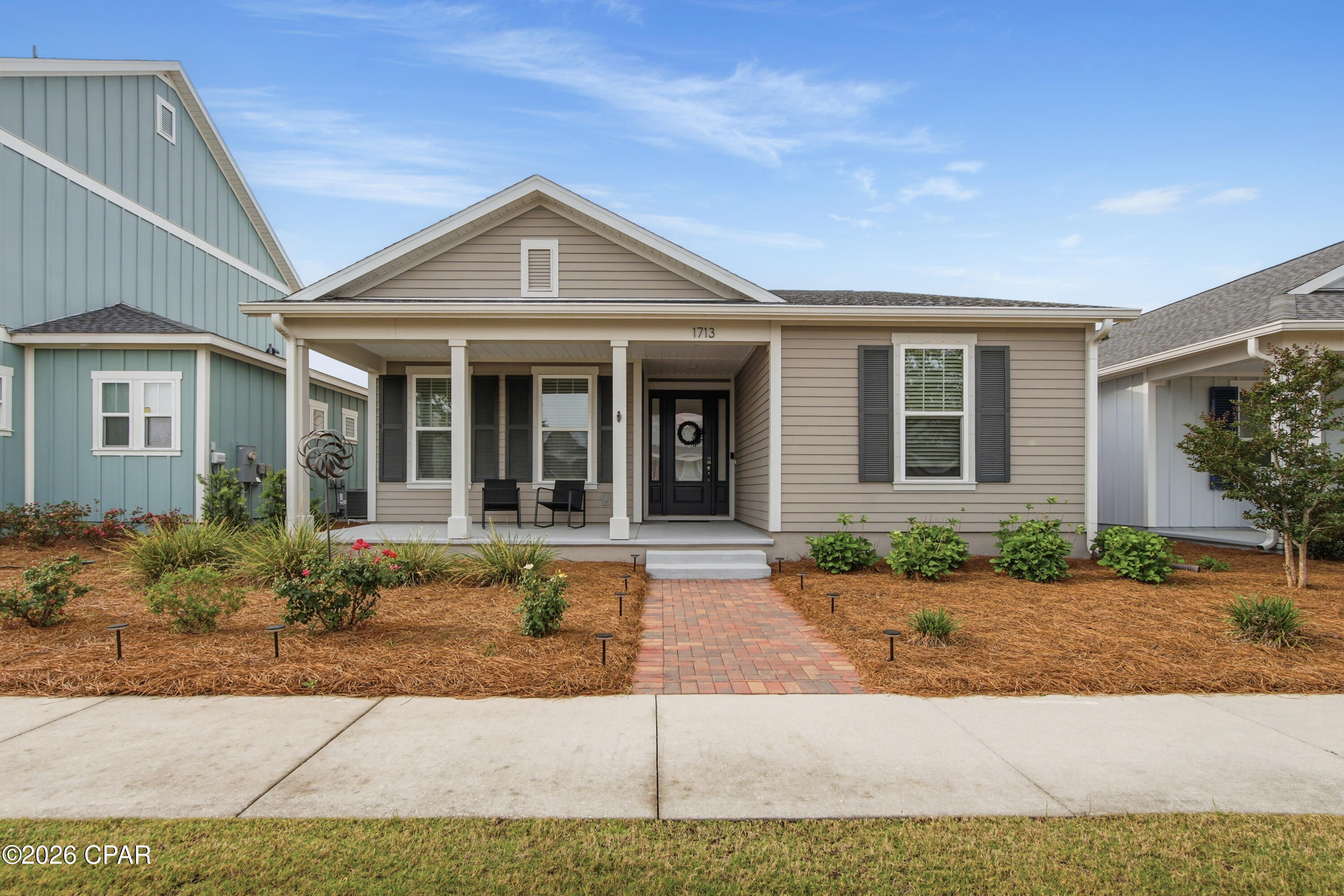 Welcome to 1713 Sweet Pea Court, a beautifully maintained 3-bedroom, 2-bath Orchid Plan by Samuel Taylor Homes located in the highly sought-after SweetBay master-planned community. Designed with both comfort and functionality in mind, this Craftsman-style home offers an open-concept layout, quality finishes, and an exceptional lifestyle in one of Panama City's most desirable golf cart-friendly neighborhoods. A golf cart is included with the home, making it easy to enjoy everything this vibrant coastal community has to offer.

Inside, the home features fresh interior paint, updated light fixtures, and thoughtful upgrades throughout. The kitchen is designed for everyday living and entertaining with quartz countertops, custom backsplash, under-cabinet lighting, stainless steel appliances including a gas range, a spacious walk-in pantry, and a large island overlooking the living and dining spaces.

The private primary suite offers a peaceful retreat with tray ceilings, double vanities, a tiled walk-in shower, and a generous walk-in closet. A split-bedroom floor plan provides privacy, while additional features include custom blinds, ceiling fans, dedicated laundry area, gutters, hurricane protection, and meticulous upkeep throughout. Step outside to a screened lanai, extended patio, and fenced backyard ideal for relaxing, entertaining, or enjoying outdoor living.

Beyond the home itself, SweetBay offers a true lifestyle destination. Residents enjoy private beach access on North Bay, miles of walking and biking trails, open green spaces, community pools, sports courts, playgrounds, kayaking and paddleboarding access, shopping, dining, and a vibrant town center. Families will appreciate having University Academy, a top-rated K-8 school, located right within the community, adding convenience and long-term value. Golf cart-friendly streets make it easy to explore neighborhood amenities, connect with neighbors, and enjoy the coastal community atmosphere SweetBay is known for.

Located just minutes from downtown Panama City, waterfront recreation, and the Gulf beaches, this home offers an exceptional opportunity for buyers seeking a primary residence in a highly amenitized master-planned community.

All measurements are approximate and should be verified by buyer if important.