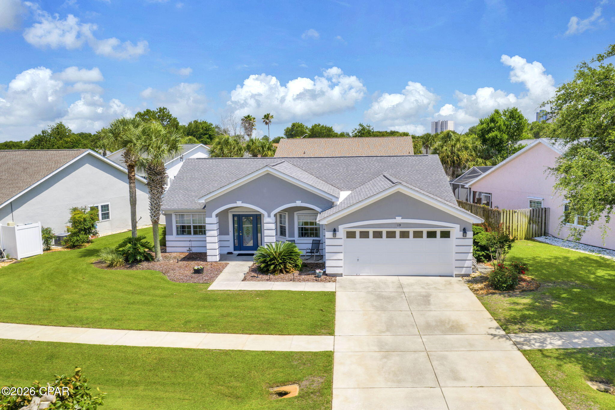 Welcome home! Take your golf cart to the beach from this super cute and well-maintained home in the desirable neighborhood of Summerwood!  Featuring a welcoming entrance, open layout, 3 bedrooms, and 2 full baths, this home has been gently used and well maintained by owners as a second home.  Enjoy a split bedroom plan with large primary bedroom and primary bath with double vanity and large closet.  New roof as of 2019, exterior painted and new HVAC in the last 5 years, new microwave   and garage door opener in the last year.  Corrugated shutters for all windows and doors give you peace of mind and also make insurance lower.  With a low HOA, neighborhood sidewalks, community pool access, a golf cart friendly neighborhood, and so close to the beach, Summerwood neighborhood provides the ideal neighborhood for the coastal lifestyle.  This home has a great location within the neighborhood; easy to get in and out, convenient to retreat to swim or relax at the community pool, and also easy to get to the beach and Pier Park! The location is exceptionally convenient, situated within a mile of Aaron Bessant Amphitheater, numerous walking trails, Pier Park, Top Golf, a wide variety of restaurants, dining options and extensive shopping.  The beach is just a short walk or golf cart ride making this home the perfect blend of location and lifestyle. This well-maintained home is an excellent choice as your next primary residence, second home, or long-term rental investment property in one of Florida's most coveted beach destinations.  Call today!