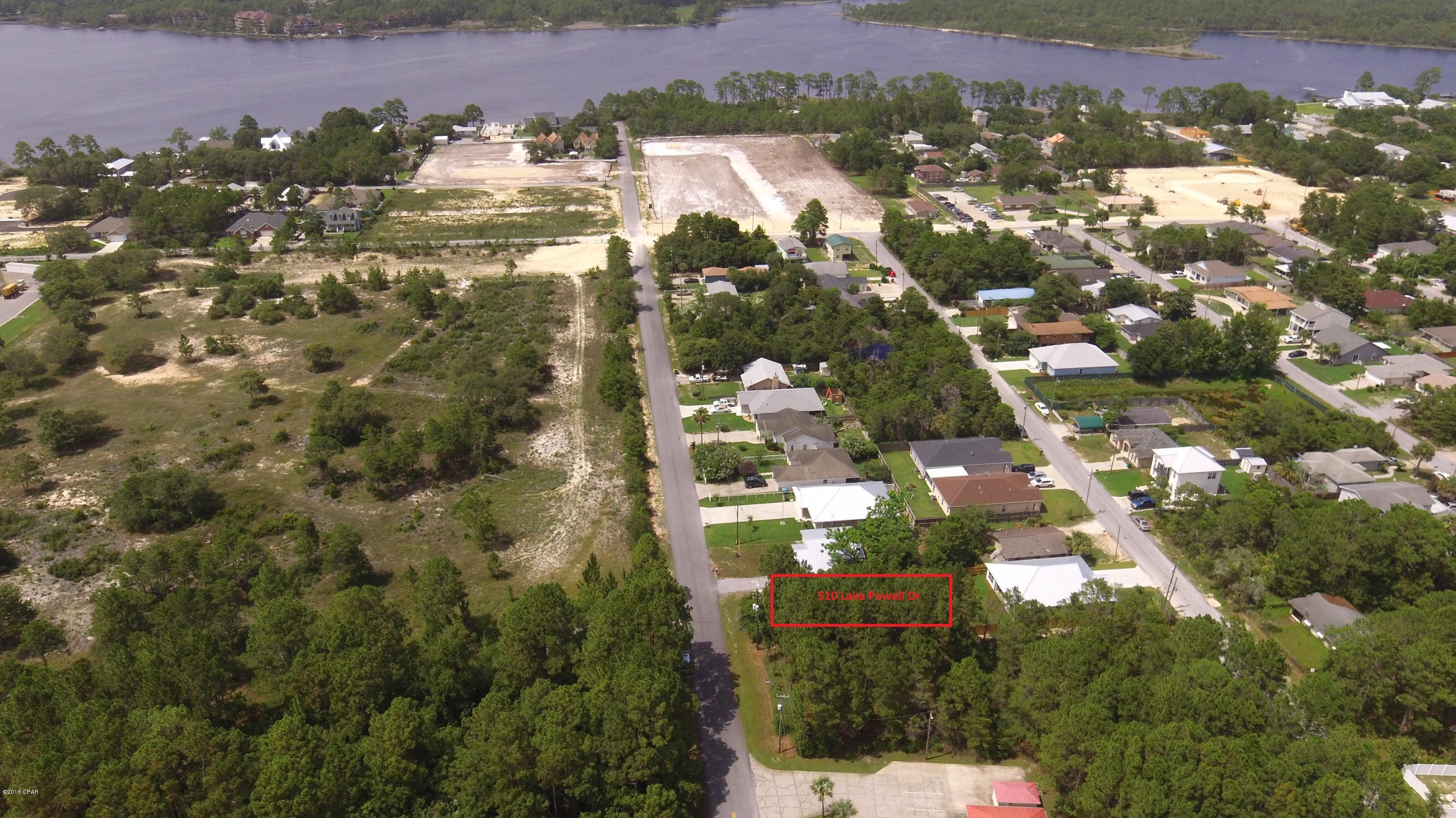 Nice building lot on the west end of Panama City Beach. This location is close to shopping and minutes from 30A. Lake Powell and boat launch nearby and less than a mile to beach access.