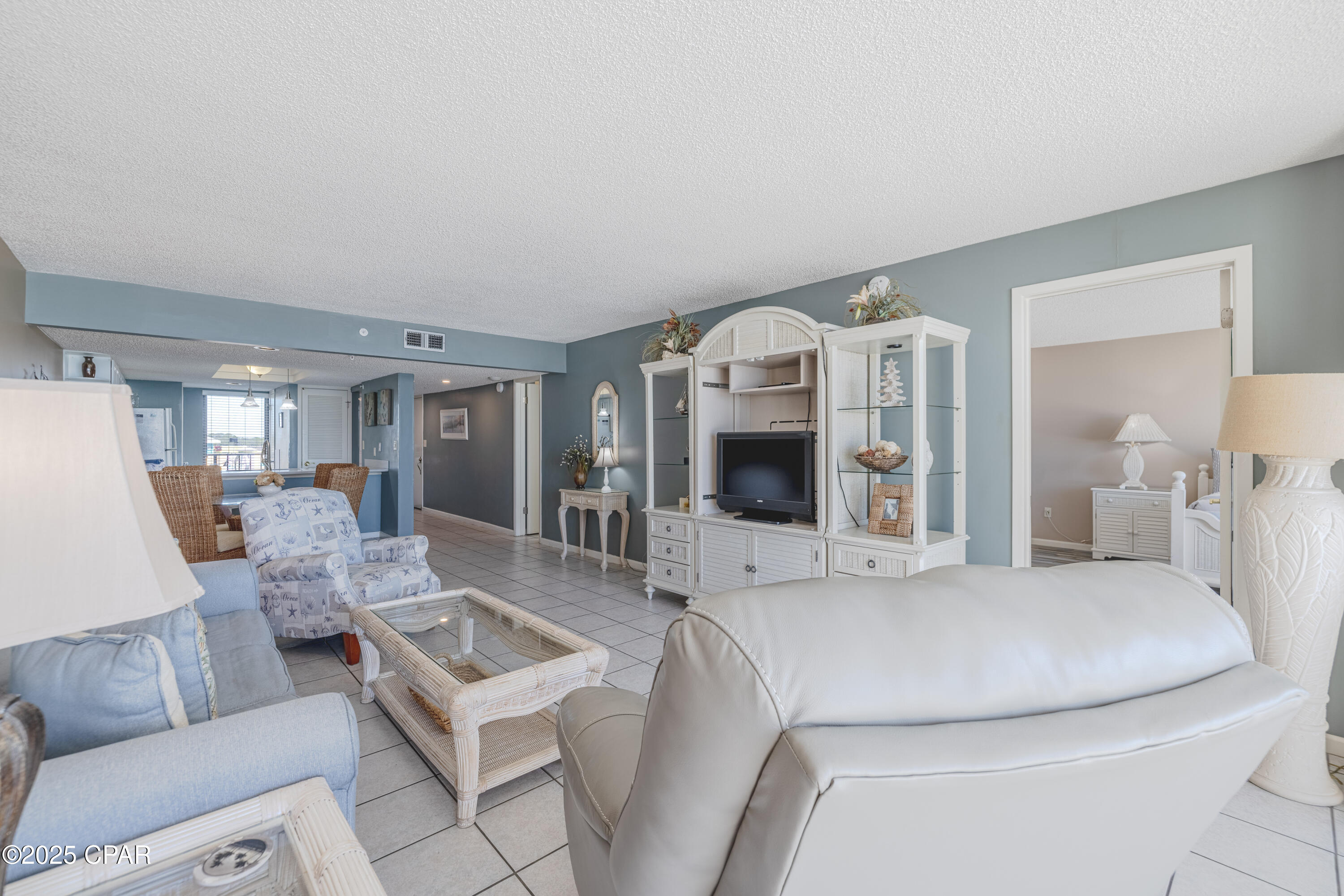 Welcome to the best place on the beach...Edgewater.  Tower 3 unit 404 is an immaculate 1 bedroom 2 bathroom, beachfront showstopper.  As you enter the unit, you're greeted with a bright and spacious open floorplan with breathtaking views of the Gulf.  Unit features updated kitchen with Corian countertops.  Oversized bedroom with 2 bathrooms. Living room features updated decor with comfy seating and patio access.  Enjoy coffee, while listening to the waves in the morning on the patio with double entrance from Primary bedroom as well as living room. Gorgeous updated bathrooms. Edgewater is the only full resort on the beach featuring 11 pools, hot tubs, golf course, tennis and pickleball courts.  On site full service restaurant with tiki bars.  Enjoy resort living on the beach.