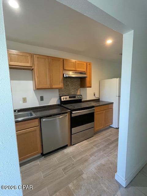 Fresh townhome with very private backyard and all yardwork, water, trash, and sewer included!  Tile floors in the kitchen and downstairs make for easy cleaning while carpeted steps and bedrooms feels luxurious on the feet.  Bedrooms have ceiling fans, downstairs has recessed lighting.  All appliances included in rent and unit is on the end for extra privacy and building is at the end of a dead end street.  Ask for your showing today.