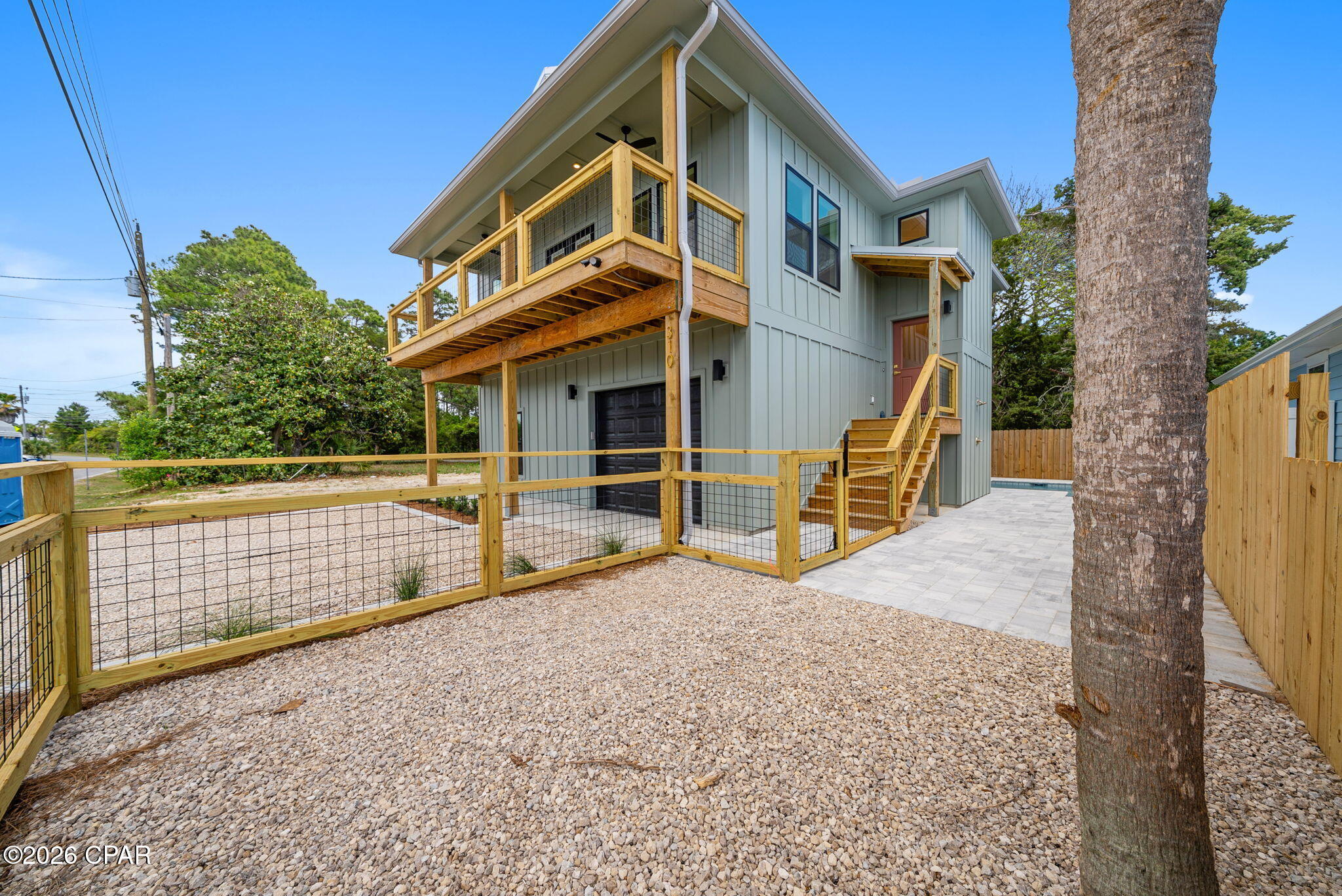New construction investment opportunity in Panama City Beach designed with both lifestyle and income potential in mind. This fully furnished, turn-key beach house offers a strong short-term rental profile with features today's guests actively search for on Airbnb and VRBO -- private in-ground pool, golf-cart-friendly garage space, covered balcony, and modern coastal finishes.

The open-concept layout maximizes guest flow and sleeping capacity potential, with a spacious living and dining area that easily accommodates groups. The well-appointed kitchen features quality finishes ideal for extended stays, while the covered balcony and resort-style pool create the outdoor experience vacationers expect when booking a Panama City Beach rental.

Built with elevated construction, a metal roof, and durable exterior materials, this property was thoughtfully designed for longevity, lower maintenance, and long-term holding value -- key factors for investors focused on ROI and asset protection. The attached garage provides storage for beach gear, owner closets, or a golf cart, enhancing rental appeal and convenience.

This property allows for immediate income production with minimal downtime between closing and first booking. The flexible floor plan supports use as a high-performing short-term rental, second home with rental income, or primary residence with supplemental income potential.

Located just minutes from the white-sand beaches of the Gulf of Mexico, Pier Park shopping and dining, 30A, Camp Helen State Park, and Northwest Florida Beaches International Airport (ECP), this home sits in a high-demand rental corridor known for strong seasonal occupancy.

Whether you are expanding your investment portfolio, completing a 1031 exchange, or securing a beach asset with appreciation and income potential, this Panama City Beach pool home delivers location, lifestyle, and revenue opportunity in one strategic package.