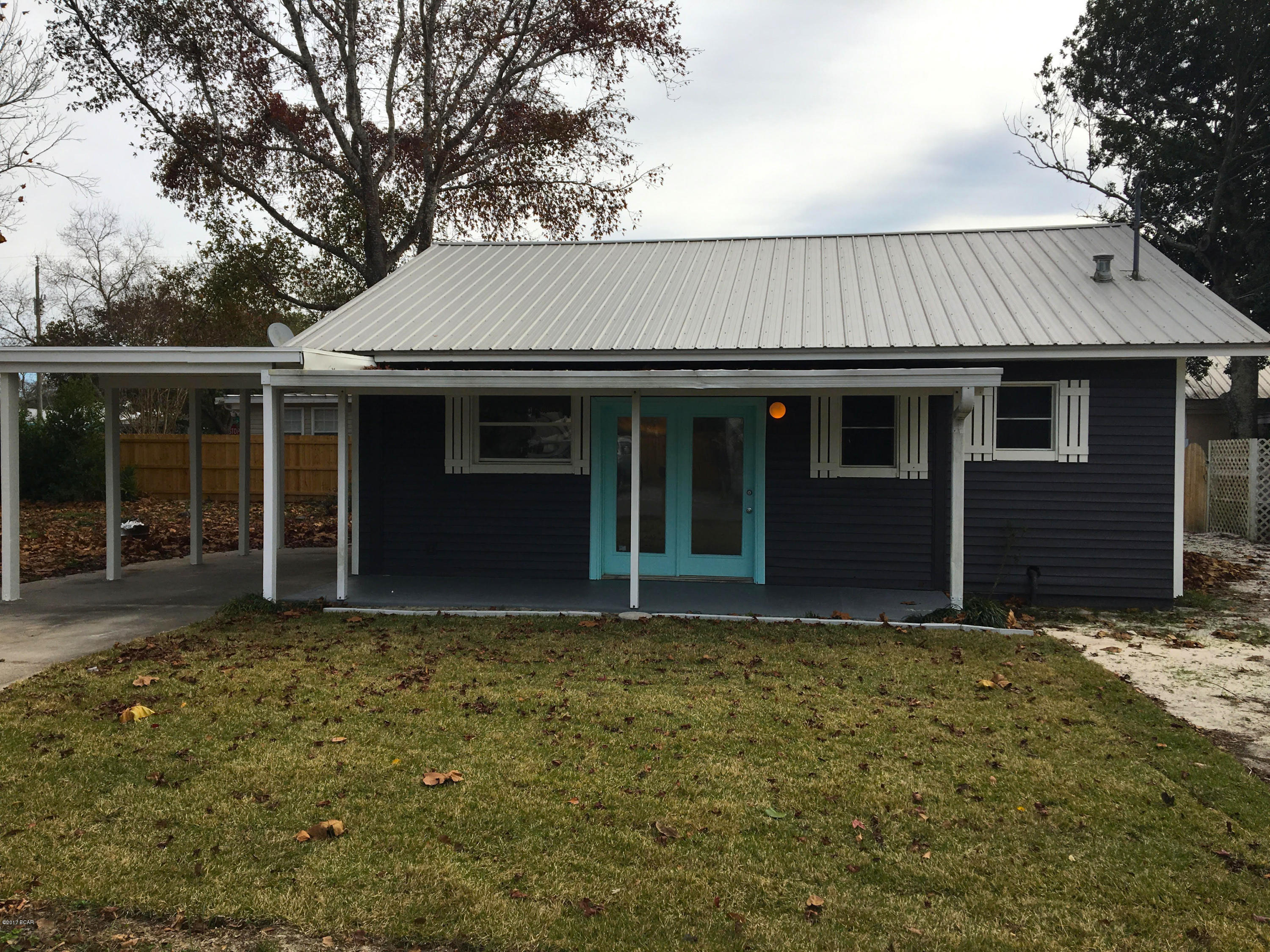 Conveniently located just 3 miles west of Pier Park and only 2 blocks from the nearest beach access! This 2 bedroom, 1 bathroom home was recently updated with new laminate flooring throughout and features new interior and exterior paint. The living area and kitchen has an open floor plan and includes a side-by-side refrigerator and a full size washer and dryer. Both bedrooms have access to the jack-and-jill bathroom. This home is just a five minute walk to the Thomas Donut & Snack Shop and the beach access. Pet negotiable with $250/non-refundable pet fee.
