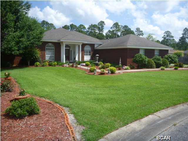 FABULOUS EXECUTIVE HOME IN COLLEGE POINT, tucked away in a cul-de-sac, on a huge lot, waiting for you! The first thing you will notice is the beautifully landscaped yard, which is a hint of things to come. Stepping into the spacious foyer, you'll see hardwood floors in every direction. To your Left are French doors leading into the ''music room'', which would make a great office. To your Right is the formal dining room. Both have palladium windows giving lots of natural light. Straight ahead you will find the formal living room, which, depending on your family, could also be a play room! The recently remodeled kit boasts all new stainless appliances (to include a super quiet Bosch dishwasher and dbl oven), granite counters, lots of cabinets and counter space. The stove top is in the