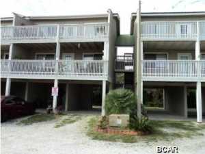Great West End Fully Furnished, Custom Designed Condo in Small (12) Unit Complex. Very quiet & private, yet close to the beach. Beautiful kitchen & bar area, large bathroom & large windows facing the Gulf. Washer/Dryer included. Oversized balcony (25 x 8) - great for relaxing, enjoying the view & summer breezes. Covered Parking with a storage room is an added bonus. Water, Sewer, Garbage & Pest Control included. Furnished unit, showings by appointment only.