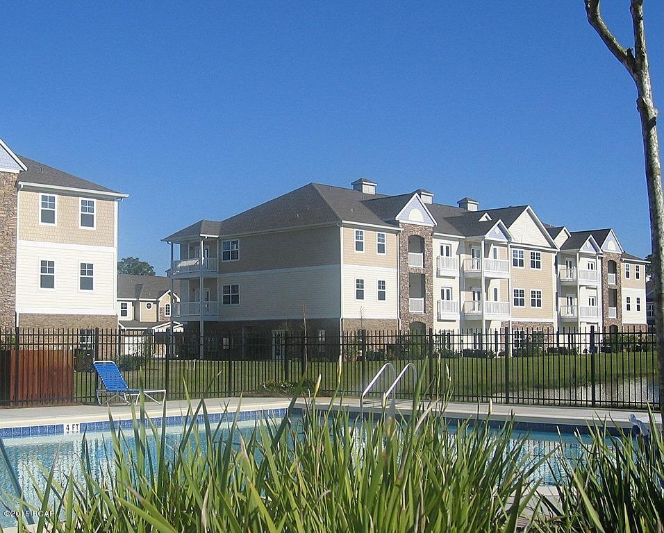 Villas At Suncrest - This is a 2 bedroom, 2 bath flat located in the heart of Panama City Beach. Just minutes form the Navy Base and a short drive to Pier Park. The Villas at Suncrest is a gated community featuring a community pool, club house, gated entrance and most units include a garage. Units all include all utilities except electricity - water, sewer, trash, basic cable, internet and local phone service. Units also feature spacious floor plans with granite counter tops, split bedroom plans, and washer and dryer hook ups.