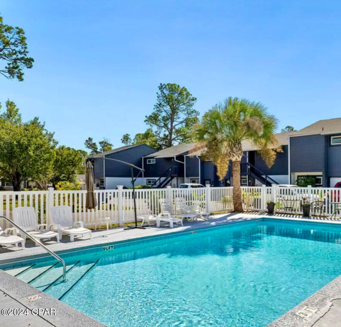 Looking for a quiet place to call home?  This spacious Shadetree Condo is IT.  Boutique community in great location. Only minutes to Navy Base & Beach.  Completely FURNISHED to include linens & kitchen setup. Easy move!  New kitchen appliances & washer/dryer.  2 king-size bedrooms with split floor plan provides much privacy. Top of the line mattresses.  Decor says - YOU ARE AT THE BEACH _ RELAX. Community swimming pool and 2 assigned parking spaces. Military Appreciation Discount........Eligible service members receive $100 off monthly rent.  Proof of active duty service required.  Call today for an appointment to see.