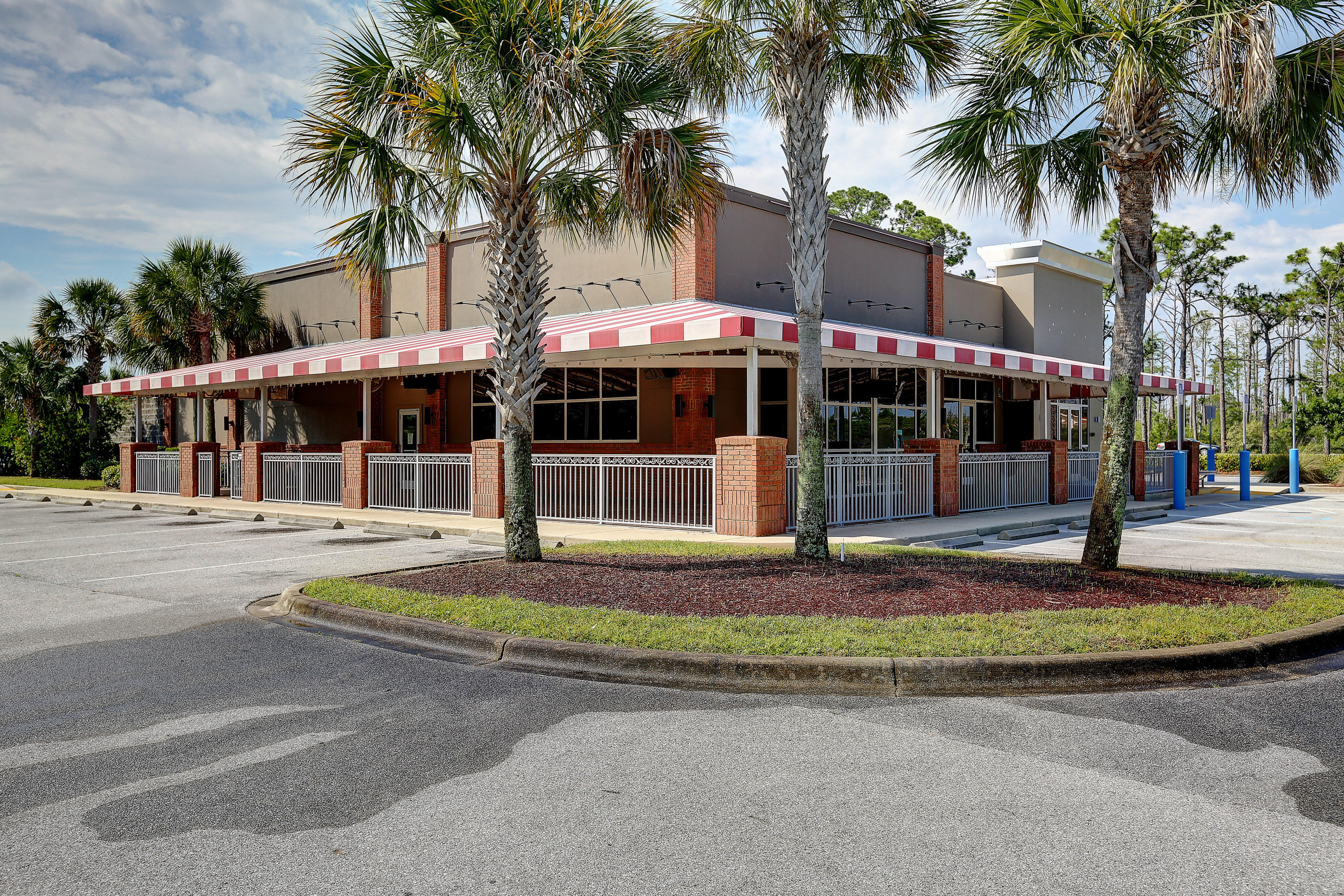 Subject site features premier construction and location. Former TGI Fridays and now leased to The Juicy Seafood Restaurant this location is ideal for a high traffic restaurant/bar.  Panama City Beach parkway is the main corridor traveled by both tourists and locals in the Panama City Beach area. Strategically positioned in front of a Home Depot and Publix shopping center, close to multiple sports complexes and new neighborhoods this location is ideal for both lunchtime, dinner and nightlife customer flow.