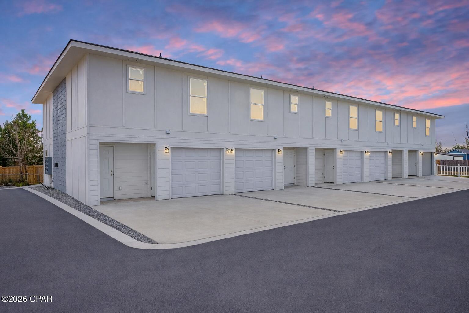 New Construction Townhome Convenient to Tyndall Air Force Base! Newly constructed two-story townhome featuring 3 bedrooms, 2.5 bathrooms, and approximately 1,300 square feet of heated and cooled living space, with an attached one-car garage. 

Community amenities include exterior maintenance and common area upkeep.

 As soon as you walk through the front door the entrance and grandeur of the entry hall is amazing with the tall ceilings and wide hallway! 

The main level offers an open-concept living, dining, and kitchen area with quartz countertops, stainless steel appliances, breakfast bar, and contemporary finishes. 

A half bathroom is located on the first floor for guest use. Rear access leads to a covered patio.

 Upstairs includes a primary bedroom is an absolute dream! Primary ensuite features a walk-in closet and built-in shelving, along with an ensuite bathroom featuring custom tile work and oversized gorgeous shower. 

Additional bedrooms, full bathroom, and washer/dryer connections are also located on the second level for convenience! 

Additional features include tall ceilings and modern construction standards. New construction may offer potential insurance and energy-efficiency advantages; buyers are encouraged to consult with their insurance and utility providers for specific details. 

The property is located approximately 6.6 miles from Tyndall Air Force Base, 1.6 miles from Winn-Dixie, and 2.9 miles from Under the Oaks Park, with convenient access to shopping, parks, and major roadways.

 Information is believed to be accurate but not guaranteed. Buyer to verify all measurements, features, and usage.