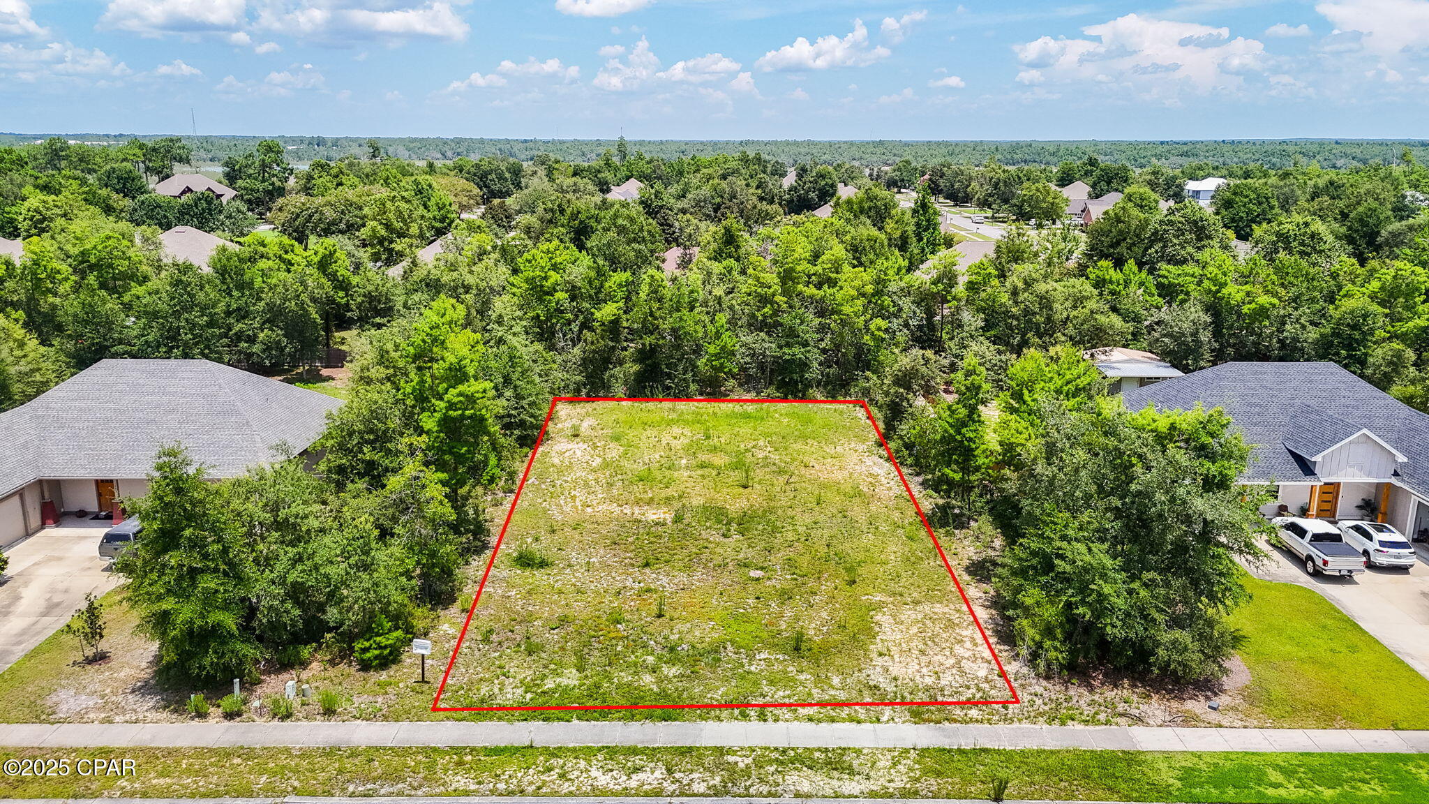 Live surrounded by trees, play all day by the lake, your dream home awaits in the gated community of Lake Merial, a 300-acre spring fed lake with amenities and a lifestyle you deserve!

Nestled on 0.52 acres, this beautiful parcel has been COMPLETELY CLEARED and is ready for build on. This homesite offers the perfect blend of privacy, nature, and possibility for you to build your dream home. 

At Lake Merial, you'll enjoy a sense of serenity that feels miles away, yet you're still a short drive to it all. Just a few minutes to grocery stores, shopping and more. This lake community exudes relaxation, southern charm and plenty of room from your neighbor while still having that community feel many desire.

Whether you're dreaming of a modern lake retreat or a timeless family home surrounded by trees, this homesite is a blank canvas ready to bring your vision to life. 

Imagine the possibilities of your own private pool, a charming garden to grow your own vegetables, a garage for all the toys, and a place you can spread your wings and enjoy being home.

Life at Lake Merial is about more than just a place to live, it's a lifestyle. Enjoy gated security, picturesque walking trails, and access to a stunning 300-acre spring-fed lake perfect for fishing, kayaking, paddleboarding, or simply soaking in the natural beauty. 

With expansive green spaces and a strong sense of community, Lake Merial offers the ideal mix of peaceful living and convenient access to Panama City, Lynn Haven and Panama City Beach, and everything in between. The Northwest Florida Beaches International Airport is a short 19 minute drive allowing easy access for those who need transportation for work or love to travel. 

Come walk the lot, breathe in the quiet, and imagine what's possible. Your dream home starts here.