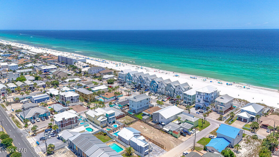 Rare PCB Beach Compound 4109&4111 Marlin St| 3 Residences • One Parcel • Two Lots from the Beach • Heated/Chilled Pool • Sleeps 18-20 • Fully Furnished & Turnkey. with effective build date June 2026

Rare opportunities like this simply don't exist anymore. Just two lots from the beach, this one-of-a-kind Panama City Beach compound offers three separate residences on one parcel--a beautifully rebuilt two-story duplex with two 2-bedroom, 1-bath residences and a stunning 3-bedroom, 2-bath main home centered around a private resort-style heated and chilled pool. Combining location, flexibility, and the quality of new construction, this is a truly rare opportunity in one of Panama City Beach's most desirable vacation rental corridors.

Professionally reconstructed and completed in June 2026, this is far more than a renovation. Thoughtfully rebuilt by the owner--not a builder flip--the property was designed specifically for luxury vacation rentals with an emphasis on quality, longevity, energy efficiency, and exceptional guest experience. Every detail was intentional, from the 10-foot ceilings in the main home and custom 8-foot hurricane-rated doors to the impact-rated windows and doors, custom transom windows, smart LB siding, designer coastal finishes, custom-built bunk rooms, and durable low-maintenance materials throughout.

Designed to comfortably accommodate 18-20 guests, the compound is ideal for large family vacations, multi-generational gatherings, corporate retreats, or premium vacation rental operations. The resort-style outdoor living area features a new heated and chilled swimming pool, two grilling stations, expansive paver decking, and a hot and cold outdoor shower, creating an exceptional space for relaxing and entertaining after a day at the beach.

Operational efficiency was equally important. Each residence has its own electric meter, each building has its own water meter, and the property includes a dedicated owner's closet, making ownership and management simple and efficient. Six off-street parking spaces provide ample room for owners and guests.

Located in the highly sought-after Lower Grand Lagoon area, you're just a short walk from the beach and minutes from St. Andrews State Park, Shell Island excursions, marinas, waterfront dining, shopping, and entertainment. Leave the car behind and enjoy one of the most walkable and desirable beach locations on Panama City Beach.

Situated in Flood Zone X no flood insurance needed and offered fully furnished and completely turnkey, this exceptional property is ready for immediate personal enjoyment or income-producing vacation rental operation from day one.

Properties offering three fully rebuilt residences on one parcel this close to the beach are exceptionally rare and increasingly difficult to replicate. Built to be owned--not flipped--this extraordinary beach compound reflects thoughtful planning, premium materials, and craftsmanship rarely found in today's investment properties.