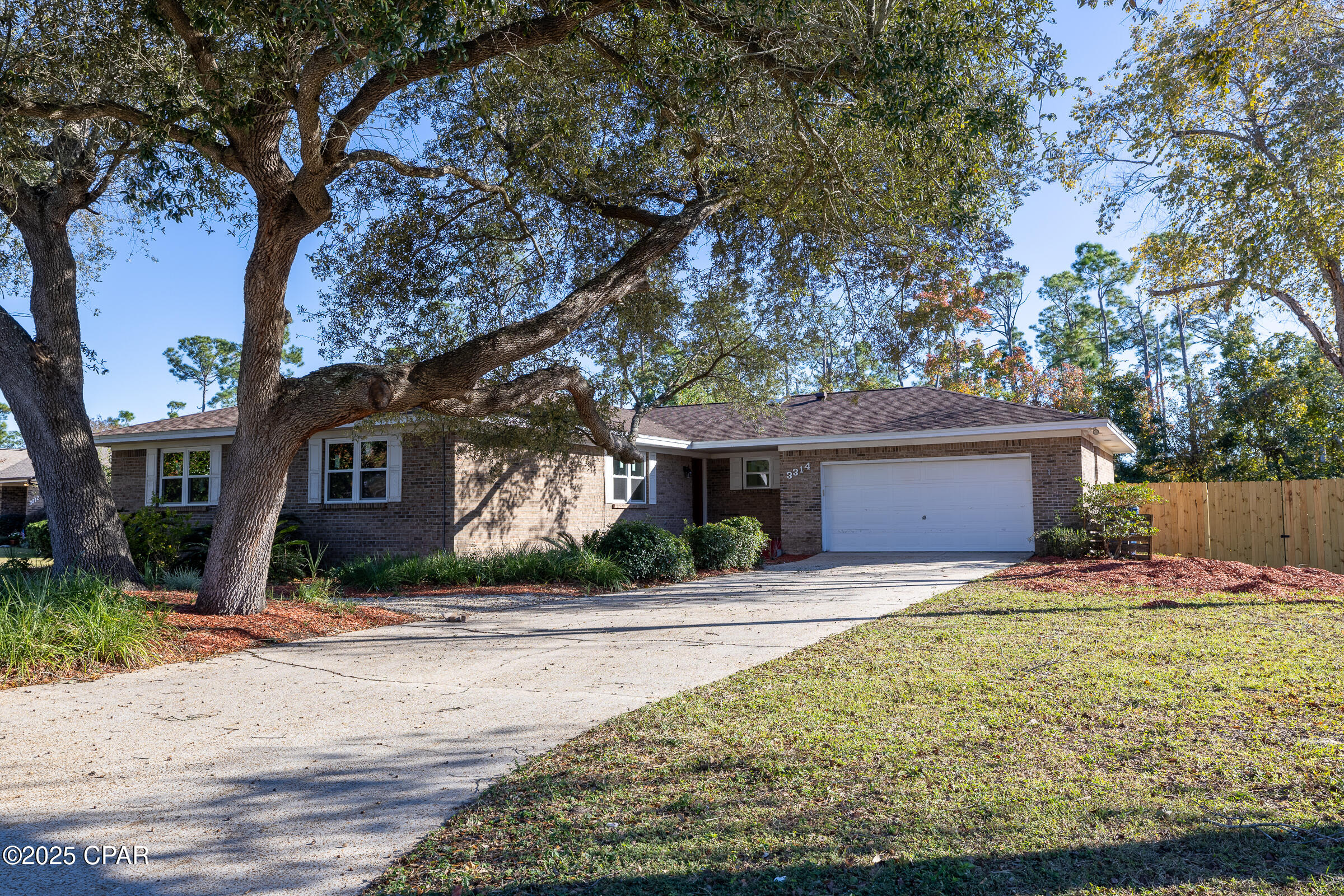 BACK ON THE MARKET... NO FAULT OF THE SELLER... EASY TO SHOW!! Beautiful Brick Ranch in a Desirable KINGS POINT, convenient to shopping, hospitals, Lynn Haven, Historic Panama City and the beautiful white sandy beaches of Panama City Beach. Large home with 3 bedrooms and 2 Baths.  New large back deck, new fencing, new inside paint and all new double pane hurricane resistant windows throughout the home. The home has  solar panels with Solar Photovoltaic electric system. Also a solar hot water heater. Solar panels installed 2019.  Solar panels are paid off. This home has beautiful Oak trees in the front yard, recently trimmed. THIS HOME IS A MUST SEE....CALL YOUR REALTOR TODAY.