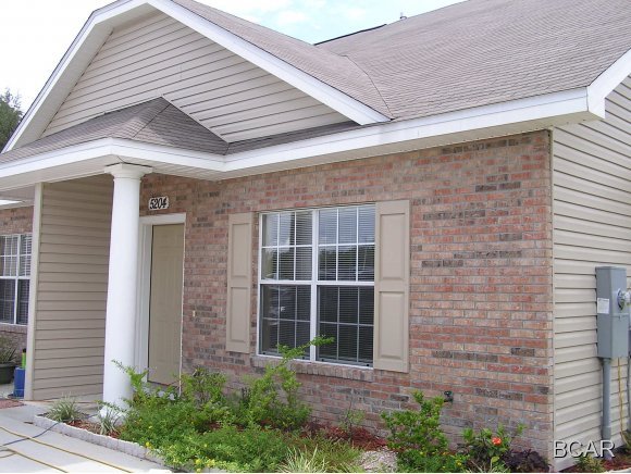 2 bedroom, 2 bath duplex on cul-de-sac. Tiled eat-in kitchen with breakfast bar. Inside laundry area with washer and dryer included. Ceiling fans throughout. One bedroom and full bath downstairs and one bedroom and full bath upstairs. Spacious, privacy fenced yard, patio sprinkler system with irrigation meter, and outside storage.