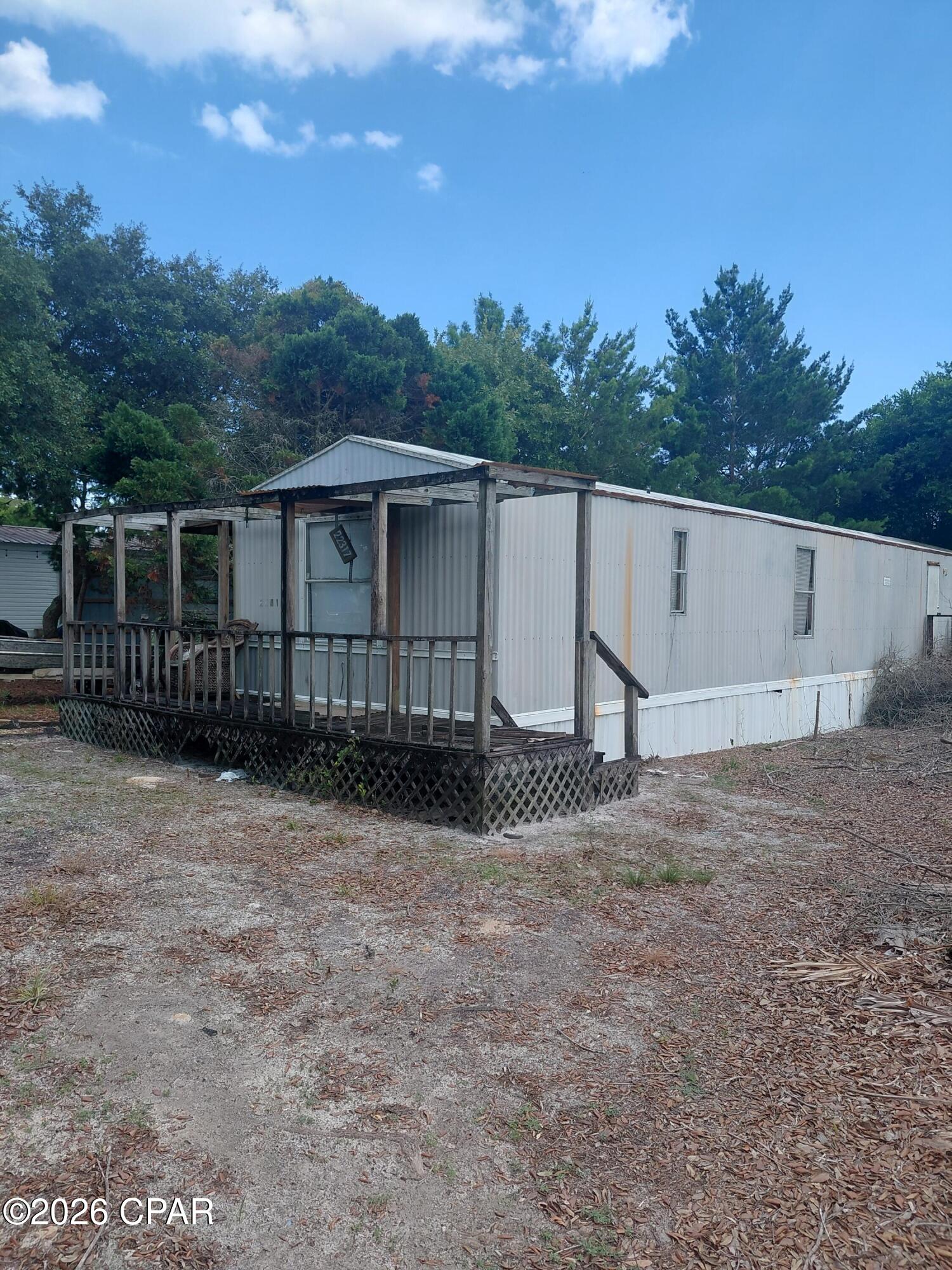 This 2-bedroom, 2-bath mobile home in Panama City Beach is priced aggressively for a quick sale. The home needs repairs and is being sold as-is, making it an excellent opportunity for those looking to renovate and add value. Conveniently located near shopping, dining, and the beautiful Gulf beaches, this property provides endless potential at an affordable price.