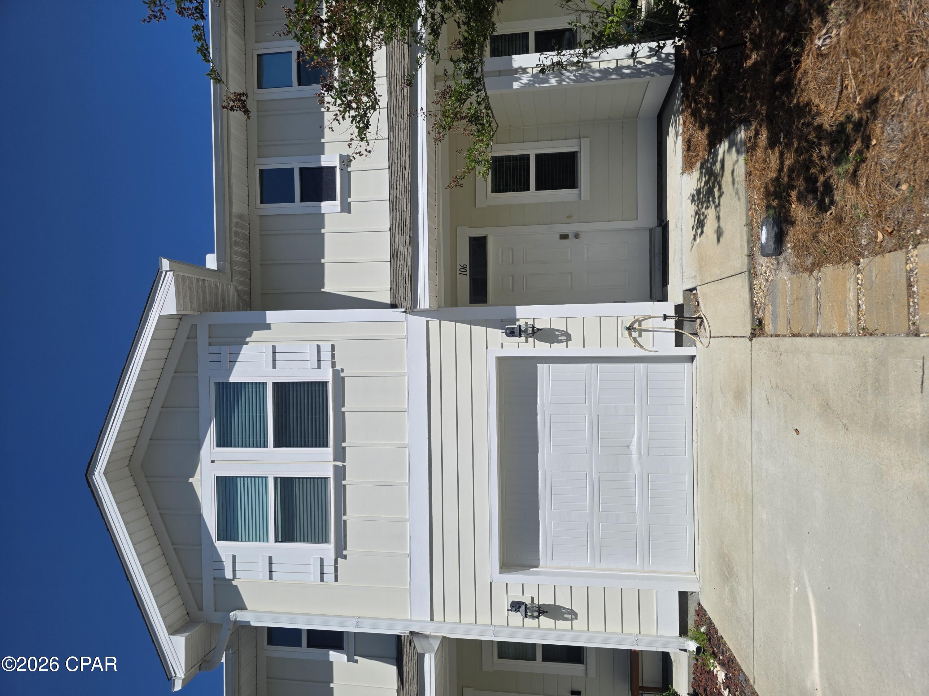 Welcome home to this clean, comfortable 3-bedroom, 2.5-bath townhouse nestled in the Waterfall subdivision on the quiet east end of Panama City Beach. With 1,480 square feet of thoughtfully laid-out living space, this home offers the perfect blend of beach lifestyle and everyday convenience -- without the hustle and bustle of the busy tourist corridor.
The open main floor features a bright living area, dining space, and a well-appointed kitchen complete with granite countertops, built-in microwave, stainless steel appliances, dishwasher, and garbage disposal -- perfect for family meals and entertaining. Head upstairs to find all three bedrooms -- Primary bedroom: 14x12. Bedroom 2: 11x10.  Bedroom 3: 10x10 -- and two full baths, and the added convenience of a full-size washer and dryer -- no hauling laundry up and down stairs!  Central AC keeps everyone comfortable through those warm Florida summers. 
Beautiful LVP flooring runs throughout, making cleanup a breeze for busy families.
Step outside to your private patio and small backyard -- perfect for grilling out and enjoying those gorgeous Panhandle evenings. HOA handles all landscaping, so your weekends stay free. Store your car, bikes, golf cart, or beach gear in the 1-car garage -- door 7' tall and 8' wide -- and keep everything dry and protected.
The beach is less than a mile away via Alf Coleman Road, and Gayle's Trails multi-use path runs just outside the subdivision, connecting you to the entire stretch of the east end all the way to scenic 30A. The neighborhood pool is just around the corner for those hot summer days, and JR Arnold High School is literally steps away -- a rare find for school-zone convenience.
This is beach living done right -- relaxed, roomy, and ready for your family to call home.