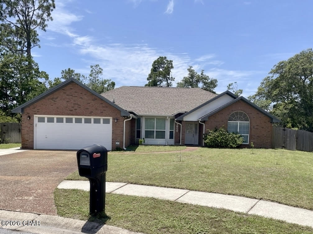Waterfront living meets space, privacy, and outdoor recreation in this beautifully maintained 3-bedroom, 2-bath brick home situated on a rare 0.54-acre lot in the Bay View area of Callaway.

Offering approximately 2,400 square feet of living space, this home features a spacious primary suite with a walk-in closet and jetted soaking tub, a cozy gas fireplace, and a climate-controlled Florida room that provides additional year-round living and entertaining space.

Launch a kayak directly from your backyard and explore the connected bay waters. One of the property's most unique features is its direct frontage on a slough that connects to the bay, providing water access right from your backyard. Whether you enjoy kayaking, fishing, wildlife viewing, or simply relaxing by the water, this property offers a lifestyle that is increasingly difficult to find.

The outdoor amenities are equally impressive. The property includes a kayak rack with kayaks, a fenced backyard area, a standalone storage shed, and a large concrete parking pad suitable for boat storage, trailers, recreational vehicles, workshop space, or additional parking. Gardening enthusiasts will appreciate the three established 4' x 8' raised garden beds and numerous fruit trees throughout the property.

Additional features include a two-car garage, a recently installed water heater, mature landscaping, and ample room to enjoy outdoor living on more than half an acre.

Conveniently located near Tyndall Air Force Base, shopping, dining, schools, and Panama City amenities, this property combines the convenience of town with the space, privacy, and waterfront access often associated with much larger properties.

Whether you're searching for a family home, a place to pursue outdoor hobbies, or a property with direct water access and room to grow, this Bay View gem offers a unique opportunity to enjoy the best of Florida living.