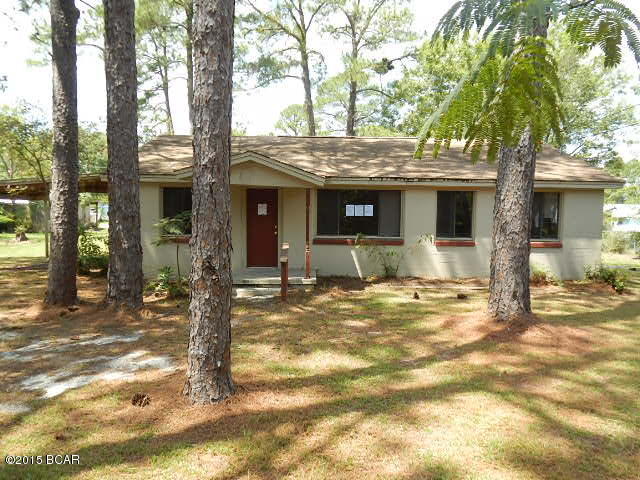 Terrific block home offers a living/dining combo, pretty kitchen w/all appliances and recessed lighting, split-planned master suite w/dual closets and full bathroom, and 2 more spacious bedrooms w/large shared bathroom. Some nice upgrades have already been done such as textured ceilings, upgraded light fixtures, and crown molding. Located just one block west of N. Tyndall Pkwy, you can enjoy super easy access to tons of everyday amenities, Walmart Supercenter, Wewa Hwy., and Tyndall AFB!EQUAL HOUSING OPPORTUNITY.