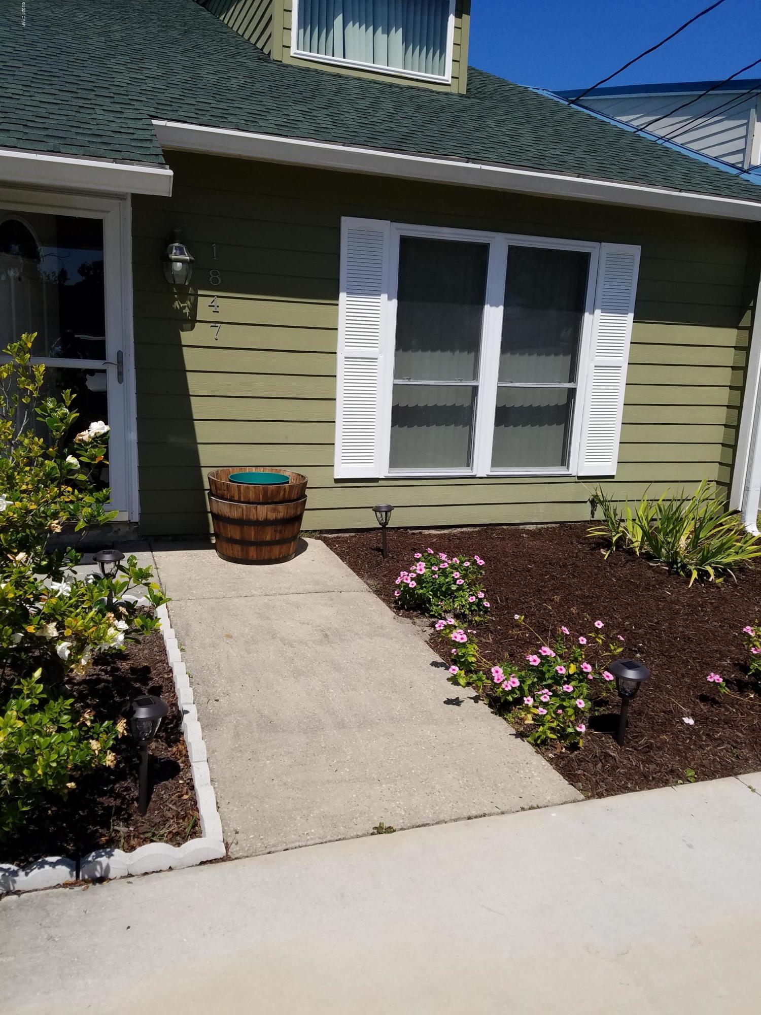 2/2 townhouse in St Andrews.  Convenient to the beach.  Near the Navy Base.  Close to all the restaurants in the Beck Ave area.    Master bedroom upstairs has its own loft.  There is a second bedroom and full bathroom downstairs. Yardcare and Pest Control included.  W/D included. Nice fenced in back yard with covered patio area.  No cats, dogs negotiable, restrictions apply.