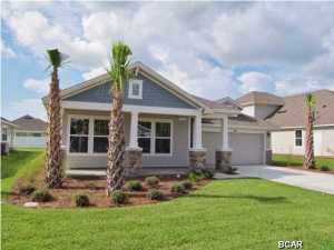 Huge end of year incentives! plus $3500 closing cost contribution (if using our preferred lender). Available for Immediate move in. The Swift floorplan from David Weekley Homes is a 4 bedroom 2 bath home that is a designer's dream. Hardwood floors throughout the main living area greet you as you enter and takes you into an spacious open plan that has an amazing kitchen which overlooks the family and casual dining rooms. White cabinets contrast beautifully with the black granite countertops which is anchored by a stainless steel apron front farmhouse style sink. The master bedroom features a tray ceiling and the oversize walk-in shower with heavily upgraded designer tile makes this the ultimate owner's retreat. Huge oversize lanai is the perfect answer for relaxing with the family.