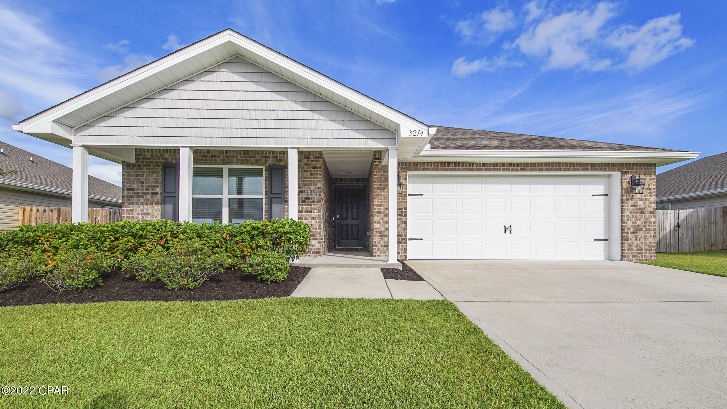 Charming 4bd/2bth Ryder floor plan located in the Magnolia Hills subdivision. This open concept/split floor plan has been very well maintained, leaving it Move-in READY! Situated just off the entry way are two secondary bedrooms, with carpet flooring and a shared bathroom with shower/tub combo. A 3rd bedroom sits on the opposite side of entry way just past the spacious laundry room. Vinyl  flooring throughout all common living areas, bathrooms, and 3rd Bdrm. The kitchen features a walk-in pantry, island/bar and overlooks the dining room & a large living room! The spacious master bedroom features his/her walk-in closets, double vanity, and a shower. Unwind on the covered front porch/back patio for a peaceful scenery! All measurements approx.