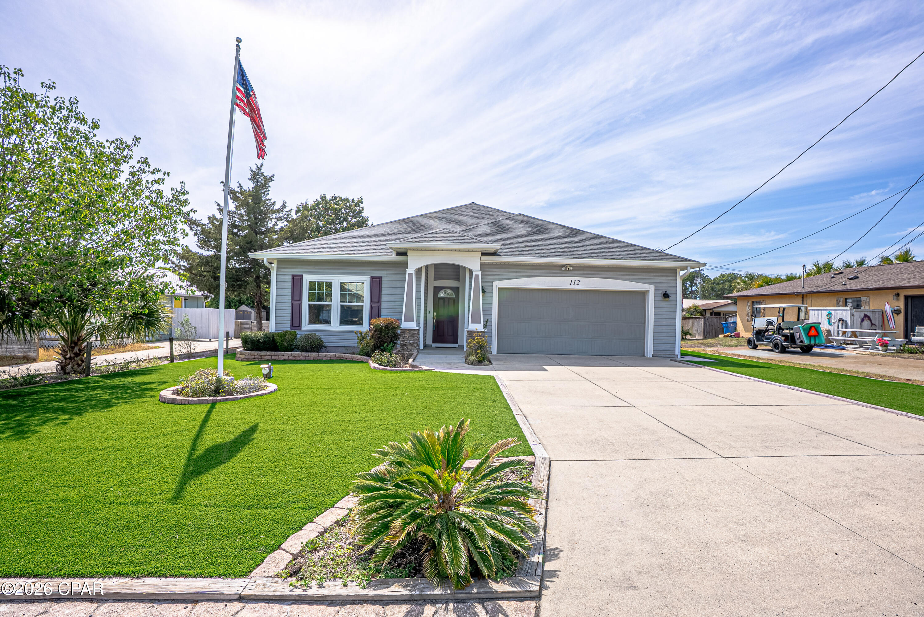 Welcome to your slice of coastal paradise--where the breeze is salty, the vibe is easy, and the beach is just a flip-flop stroll away. Built in 2017 and located only two blocks from the sugar-white sands, you'll love the quick walk to beach access #75 at the end of Vestavia Street.

This custom-built beauty was designed for relaxed living without cutting corners. With sturdy 2x6 construction, 9-foot ceilings, and top-tier insulation (R-21 walls, R-49 ceilings), the home stays cool, quiet, and comfortable year-round. High-impact windows, energy-efficient roof trusses, and thoughtful upgrades like soundproofed bedroom walls and HVAC vents in every nook--even closets--make everyday living feel like a breeze. Step inside and feel the warmth of engineered hardwood floors flowing throughout, leading you into a bright, open-concept living space filled with natural light. It's the perfect spot to kick back after a beach day or host friends for a sunset dinner. The kitchen shines as the heart of the home, featuring a large island, custom all-wood cabinetry with soft-close details, stainless steel appliances, a spacious walk-in pantry, and stunning quartz countertops and backsplash.

Slide open the door and let the outside in--your covered porch is ready for morning coffee, evening cocktails, and that steady coastal breeze.

This home offers two dreamy primary suites, each with its own spa-like bath--dual vanities, quartz counters, ceramic tile, and oversized walk-in closets make each space feel like a private retreat. A third bedroom gives you flexibility for guests, a bunk room, or a home office.

Practical touches keep life simple, like a separate utility room and a two-car garage that opens into a mud/laundry space--perfect for dropping sandy gear after a day by the water.

Out back, the lifestyle keeps going. A spacious 14' x 22' detached shed--built to match the home--can be whatever you want it to be: beach workshop, art studio, home office, or your ultimate chill zone.

Low-maintenance, high-quality, and full of coastal charm--this home is ready for you to settle in, unwind, and live that beach life every single day