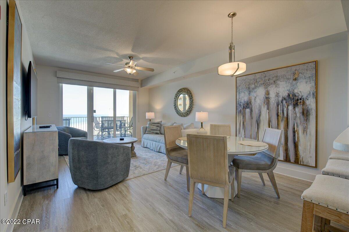 Price Reduction!  Higher Floor on this beautiful new construction condo,  less than a year old and the closest condo to Pier Park! It is professionally furnished with top of the line luxury furniture. No carpet in the entire unit! The interior is equipped with luxury vinyl flooring, stainless steel appliances, and quartz countertops. The showers have cultured marble which means no grout lines to clean! The oversized balcony has amazing views of the sugar sand beaches and Pier Park! The resort offers an oversized swimming pool which is heated in the winter months, a great fitness room with all the equipment needed, 9 rentable cabanas, and an onsite restaurant/donut shop! This unit is rental ready!