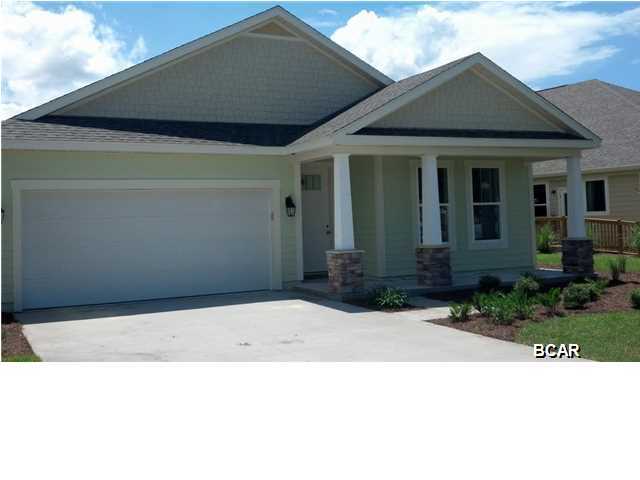 Beautiful new construction home in the lovely Whisper Dunes Subdivision Phase 2B.  This home features a Cobia Floor Plan with a Craftsman Elevation. A Samuel Taylor built home includes standard features such as designer carpet in main areas and bedrooms, 8 ft. 2 panel craftsman interior door package, brushed nickel fixtures and faucets throughout, insulated (R19) interior common walls and insulated (R38) ceilings, and durable Sherwin Williams premium interior wall paint. Kitchen features stainless steel appliance package (range, dishwasher, & microwave) and oversized 36" wood cabinetry with crown molding, and granite counter tops. Full bathrooms include raised vanity heights, large tile flooring in bathrooms and laundry rooms, 2 x 6 Exterior Wall Construction, and hurricane tie down rod anchor system. Exterior of home includes coastal and craftsman architecture, spacious 2 car garage, architectural roof shingles with an extended warranty, low maintenance aluminum fascia and vinyl soffits, termite treated foundation, Hardi-Plank siding with an extended warranty, and durable Sherwin Williams Loxon exterior paint. All new construction homes are backed by a 2-10 Home Buyers Warranty. Your HOA dues includes lawn maintenance for the home. The Whisper Dunes subdivision includes sidewalks, curb & gutter, a beautiful community pool and pool cabana. Whisper Dunes is a golf cart friendly community and you are within a short driving distance to our beautiful beaches, Pier Park shopping, NW FL Beaches International Airport, and the beautiful 30A South Walton area. Choose your lot, floor plan & elevation, choose your design options, and pick your paint colors! All measurements and sizes are approximate, please measure for accuracy and verify all sizes.