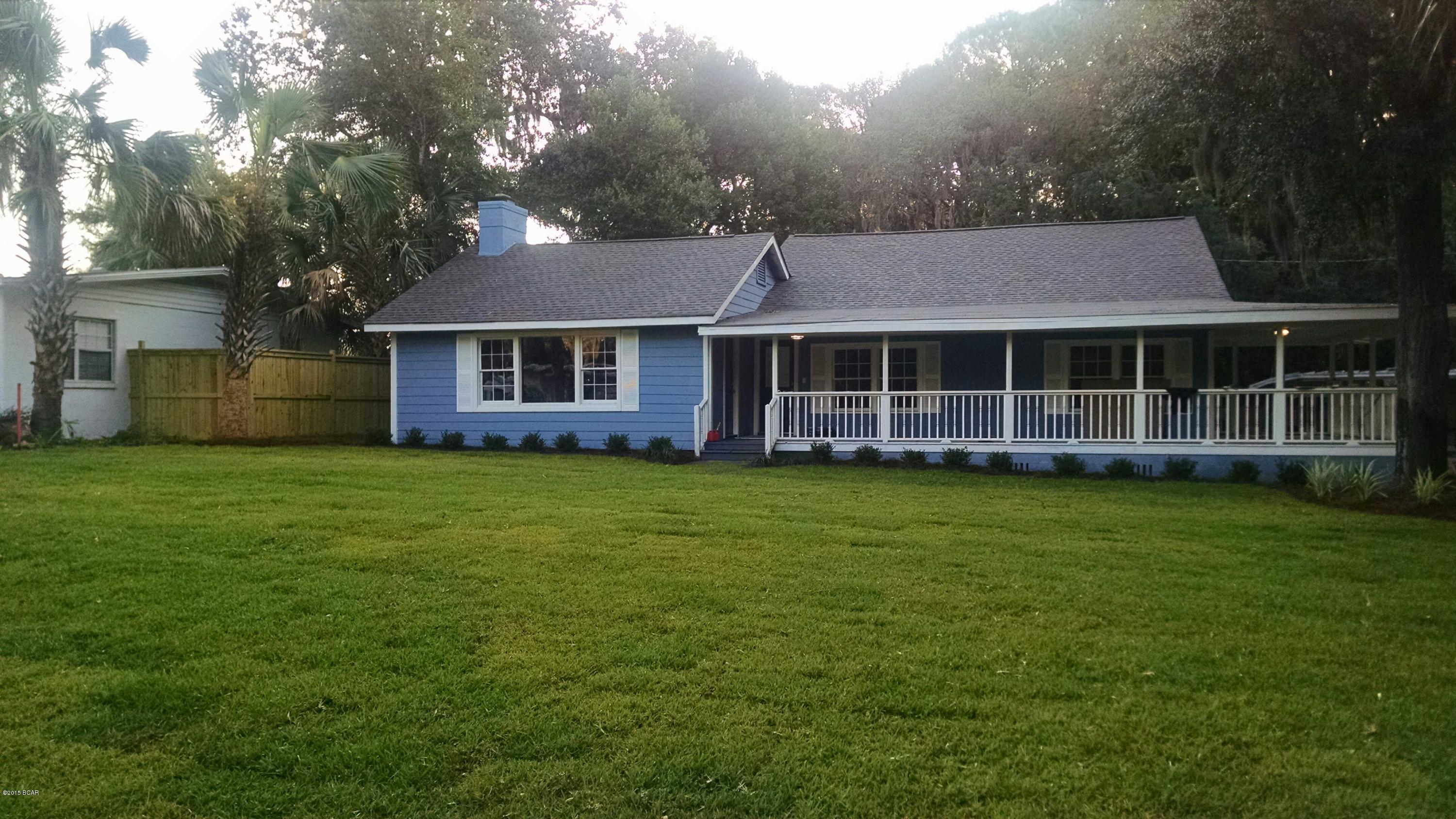 Beautiful 3 bedroom 2 bath home on large 1.07 acre lot in St Andrews. Home has been completely renovated.New air,kitchen counters, cabinets,appliances.Hardwood,tile,and carpeted floors. Greatroom has stone fireplace with built-in shelving. Big front porch perfect for rocking chairs.Steps from St.Andrews bay.