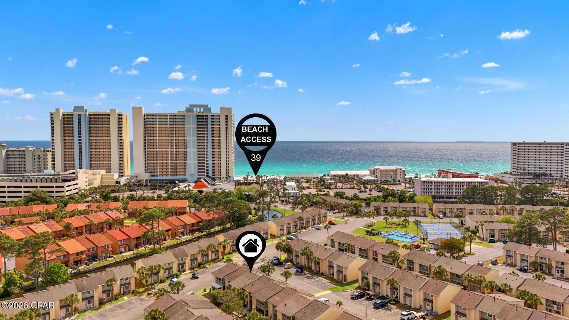 CURRENTLY UNDER CONTRACT, SELLER WILL CONSIDER BACKUP OFFERS. Beach Life, Rental Income & Incredible Value, All in One! This is the beach townhome you've been waiting for! Search on YouTube ''107 W Leslie Ln | Affordable Townhome Near the Gulf!'' for video tour. Fully furnished and rental-ready, all you need to bring is your suitcase and toothbrush. Located just a 5-minute walk to the beach, this beautifully maintained unit offers unbeatable value and comfort. Enjoy your evenings on the tropical back patio or relax on the screened-in balcony, surrounded by 11 sparkling community pools and Florida nature. With 2 assigned parking spaces right at your door and additional golf cart parking, convenience meets coastal charm. Additional highlights: VA & FHA approved, STR-friendly with strong projected GRI. Exceptionally cared for, this is a rare opportunity to own a move-in-ready beach retreat in one of Panama City Beach's most sought-after communities. You won't find a better deal at the beach! Call your agent TODAY! LOW HOA fees include: 11 pools(5 heated), pickleball, shuffleboards, water-front restaurant & pool, mini golf, exercise room, tennis courts, playground, WIFI, pest control, termite bond, trash, ground keeping, property patrol, gated community and more.