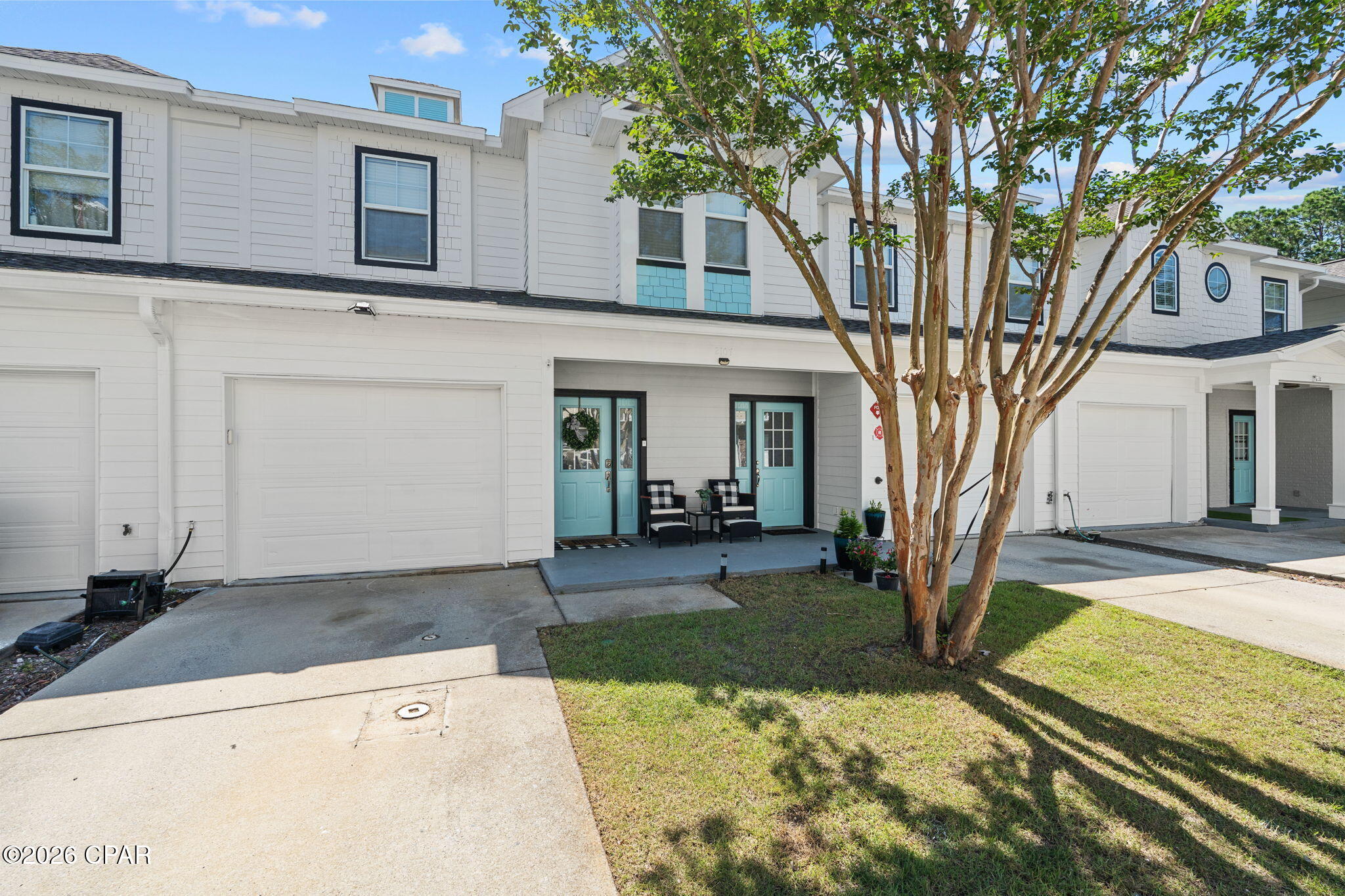 Welcome to coastal living at its finest! Nestled within a desirable gated community just minutes from the Gulf and public beach access, this beautifully maintained 2 bedroom/ 2.5 bathroom condo WITH a garage offers comfort, convenience, and a low-maintenance lifestyle. Step inside to find luxury vinyl plank flooring throughout both levels, creating a seamless and modern look. The open-concept kitchen features stainless steel appliances, a convenient breakfast bar, and overlooks the spacious living area, making it perfect for entertaining family and friends. A half bath downstairs adds extra convenience for guests.
Enjoy relaxing mornings on the covered front porch and unwind in the evenings on the covered back patio. Upstairs, you'll find two spacious master suites, the first master bedroom features a walk-in closet and an en-suite bathroom with a granite-topped vanity and tub/shower combination. The primary master suite boasts a large walk-in closet, dual granite vanities, and a tub/shower combination, creating the perfect retreat. Whether you're looking for a primary residence, vacation getaway, or investment opportunity, this move-in-ready condo offers the ideal blend of coastal charm and modern amenities in a prime location near shopping, dining, and the beautiful Gulf Coast beaches. Amenities include - 2 pools, fitness center, clubhouse, community grills.