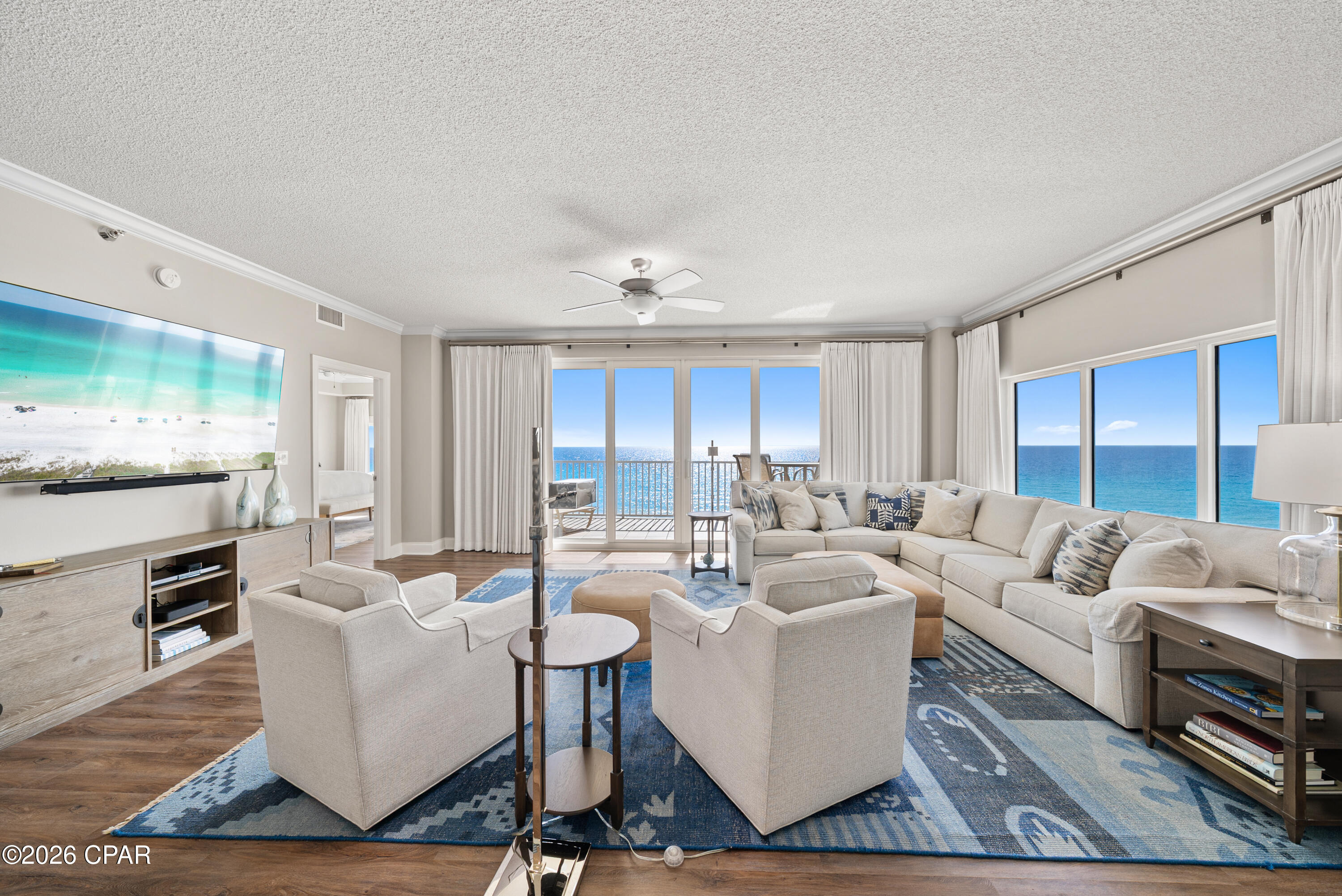 Experience Gulf-front living at its finest in this rare, 2300 sq ft corner residence at St. Andrews Park Place, where sweeping panoramas of the emerald Gulf waters and spectacular sunsets define the lifestyle. Designed for those who demand views and quality, this sixth-floor, west-facing home showcases light-filled living with panoramic water views from virtually every room and multiple private balconies — including direct Gulf-facing outdoor space off the living area, master suite, and secondary bedroom.

Step inside to an open-concept floor plan with luxury flooring throughout, Crown moulding and a beautifully updated kitchen that opens to the living and dining areas — all with unobstructed Gulf vistas that elevate daily living and entertaining alike. Each of the three generous bedrooms features its own en-suite bath and water views, providing exceptional comfort and privacy. The luxurious master suite includes balcony access, a spa tub, and a walk-in closet.

This residence has been thoughtfully renovated and maintained, with timeless finishes that blend coastal sophistication with inviting ease. An in-unit washer and dryer, abundant storage in closets and utility hallway, and private garage parking enhance everyday convenience, with ample additional guest parking available.

St. Andrews Park Place is a low-density, gated building with only 20 units, offering an exclusive, non-rental environment just steps from the water. Enjoy a beachfront pool and spa, direct beach access down sugar-white sands, and bordering the pristine St. Andrews State Park — perfect for nature lovers and outdoor enthusiasts. Quiet yet connected, you're minutes from marinas, the St. Andrews Pass, and Shell Island's world-class recreation.

Furnishings convey with minor exclusions, making this the ideal second home, vacation retreat, or coastal escape. Don't miss an opportunity to own one of the most distinguished Gulf-front residences in the area.

Measurements are approximate. All information is believed to be accurate but should be verified by the buyer if important. Reach out to schedule your private showing today.