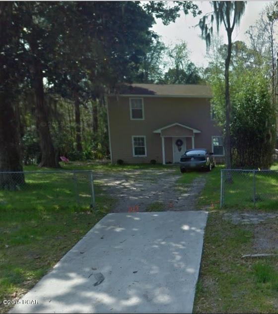 This charming 3 bedroom, 1 & 1/2 bath 2 story home is centrally located in Lynn Haven. Features a split floor plan, kitchen with lots of storage for all your kitchen items as well as a large pantry, broom closet and a large storage closet under the back of the staircase. Washer/dryer hook ups. Large master bedroom with walk in closet. Both of the guest bedrooms also have spacious closets. This lot is surrounded by chain link fencing, which is equipped with two yard buildings, one is in the front and a larger one in the back yard. Pets are negotiable with a non-refundable $150 per animal fee.