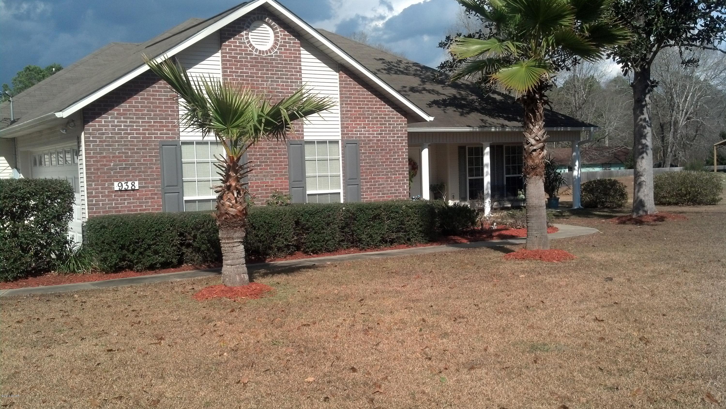 Lovely custom built 3/2 home nestled in a beautifully landscaped yard. Built by Ted Tyus in 2002 for the owners, the open concept home features a split floor plan. Large windows in every room make this comfortable home light and airy! The galley kitchen has two pantries, ample cabinets and counter space. One pantry is wired at eye level for a microwave. The large bay windows in the kitchen eating area makes the room bright.The living room/dinning room opens out onto a covered porch that adjoins the open deck. A large master bedroom has plenty of space for a sitting area and a king size bed. There is a large walk-in closet and a double closet in the hall leading to the master bath. The master bath has double vanities, one with a dressing/makeup area, tub/ shower with wall mounted handicapped bars. Each of the other bedrooms have large double closets. The two car garage has a new automatic door opening system.There is a 12'x24' metal storage building for lawn equipment. Motivated seller must relocate