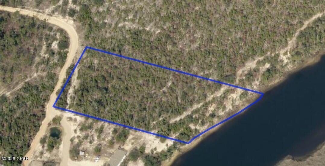 This 2.29 acre waterfront lot sits on a  lovely bluff overlooking the intercoastal waterway in eastern Bay County.  This lovely and secluded area of Allanton would make a fantastic location to build your dream home or private getaway.  The water is very deep here, and you are a short boat ride to east bay and then Tyndall bridge.  
The fishing is awesome and the water is well suited for kayaking, canoeing, or any size boat you have.  Come check out this over 2 acre lot with approx. 300 ft of water frontage.   The zoning is Bay County Conservation Habitation (CSVH) which allows residential uses.   If interested, there is an additional 81 acres available for $999,999.  MLS # 695288