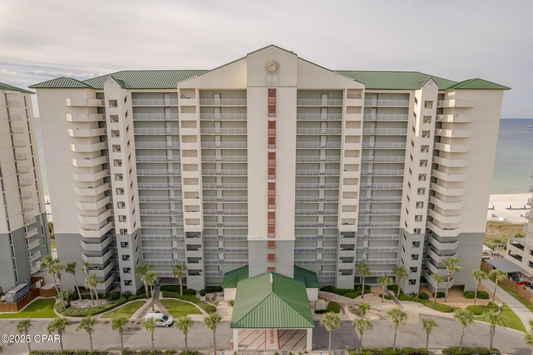 This condo is gorgeous with exquisite decorations and high end furnishings and appliances.  ALL rooms face the beach, which is the best floor plan of any unit on the Gulf.  This unit is completely covered with luxury vinyl plank flooring, Upgraded Stainless Steel appliances, Upgraded stack washer and dryer.  Polished granite counter tops.  Flat screen T,V.'s in every room.  The Master Bedroom features a King size bed, with a beautiful walk-in shower and dual vanities, while the Guest Bedroom features e queen size beds, double vanity, garden style tub and shower.  Each Bedroom has a private door to the balcony.  The Resort has 3 pools with 2 Polynesian style pools that are heated, and a large Caribbean pool with waterfalls and palm trees. There are 3 hot tubs located at each pool.  BE SURE TO VIEW THIS UNIT BEFORE YOU BUY!