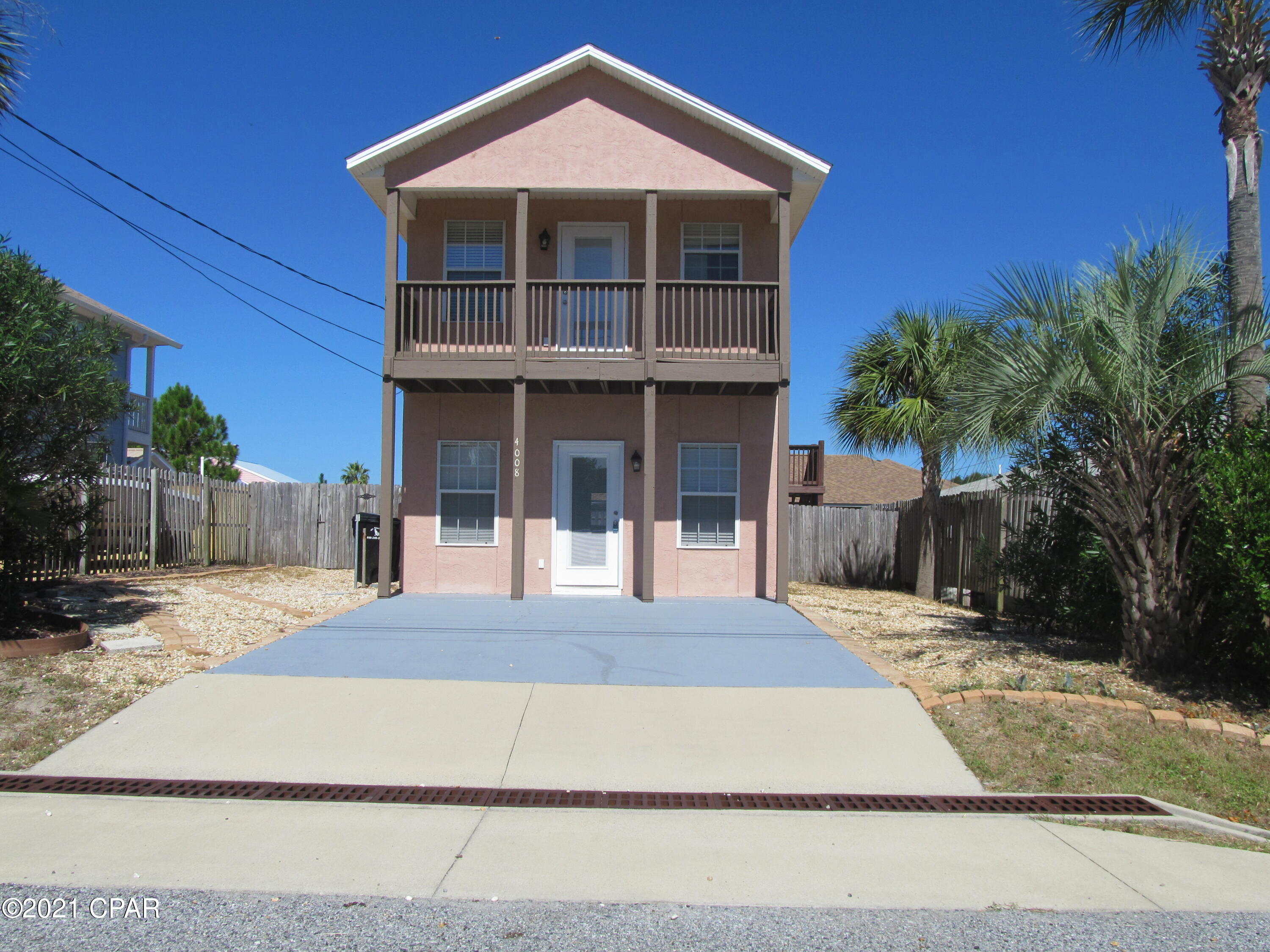 Walking distance to the beach!  3 bedroom 2.5 bath 2 story home with 2 parking spaces features 2 balconies with gulf view from the master bedroom balcony, open living and dining area.  This home features bedrooms and full baths are upstairs and privacy fenced in backyard with storage shed.

2 pets with $50.00 pet fee per pet and $250.00 pet deposit per pet.  Weed control included for the rock landscape.